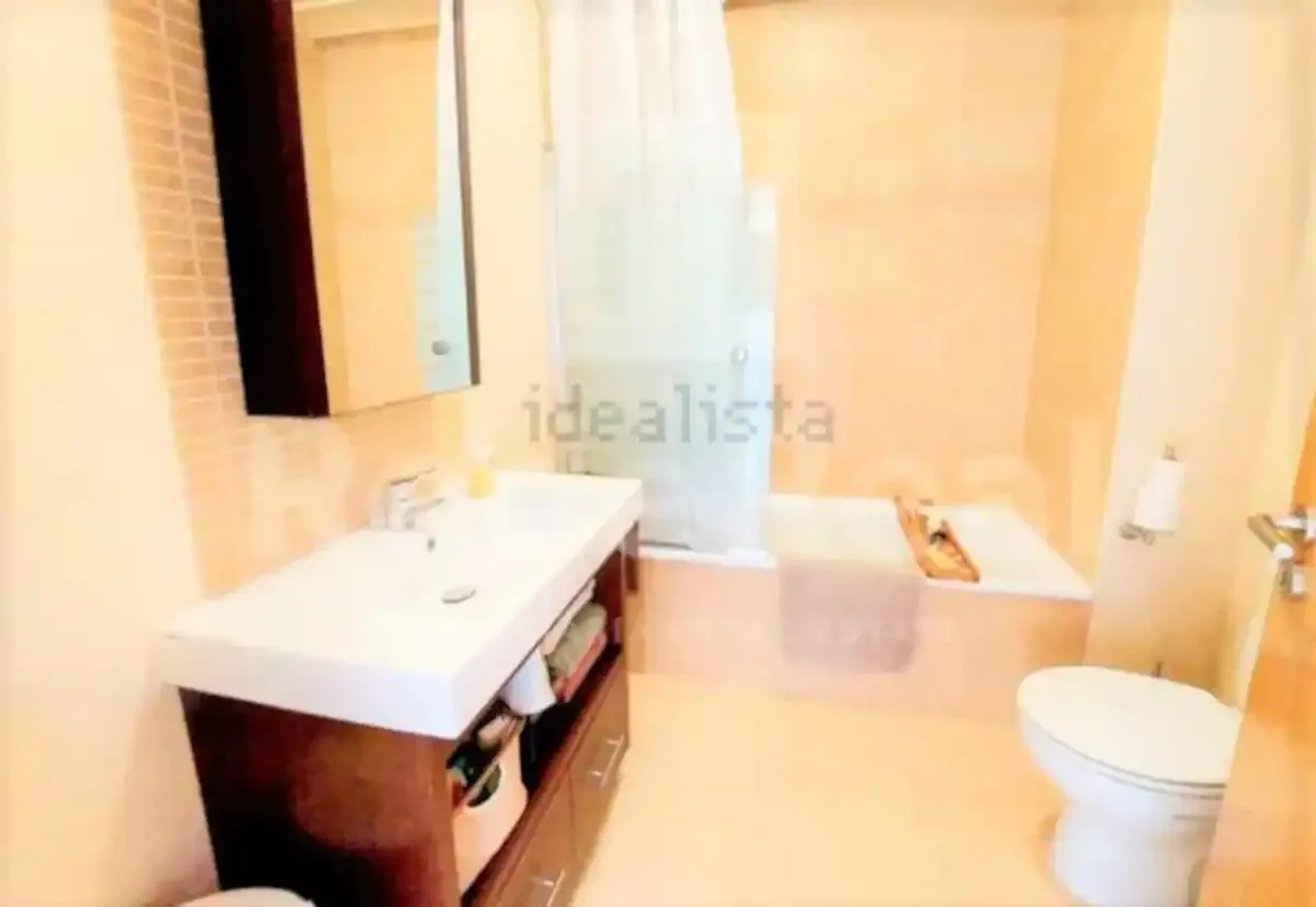 Bathroom with tub and vanity