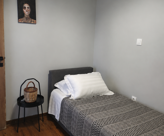 Simple bedroom with single bed