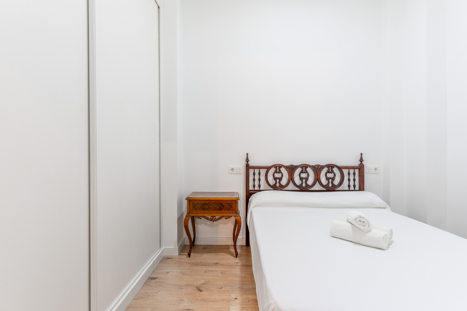 Bedroom with wardrobe and nightstand
