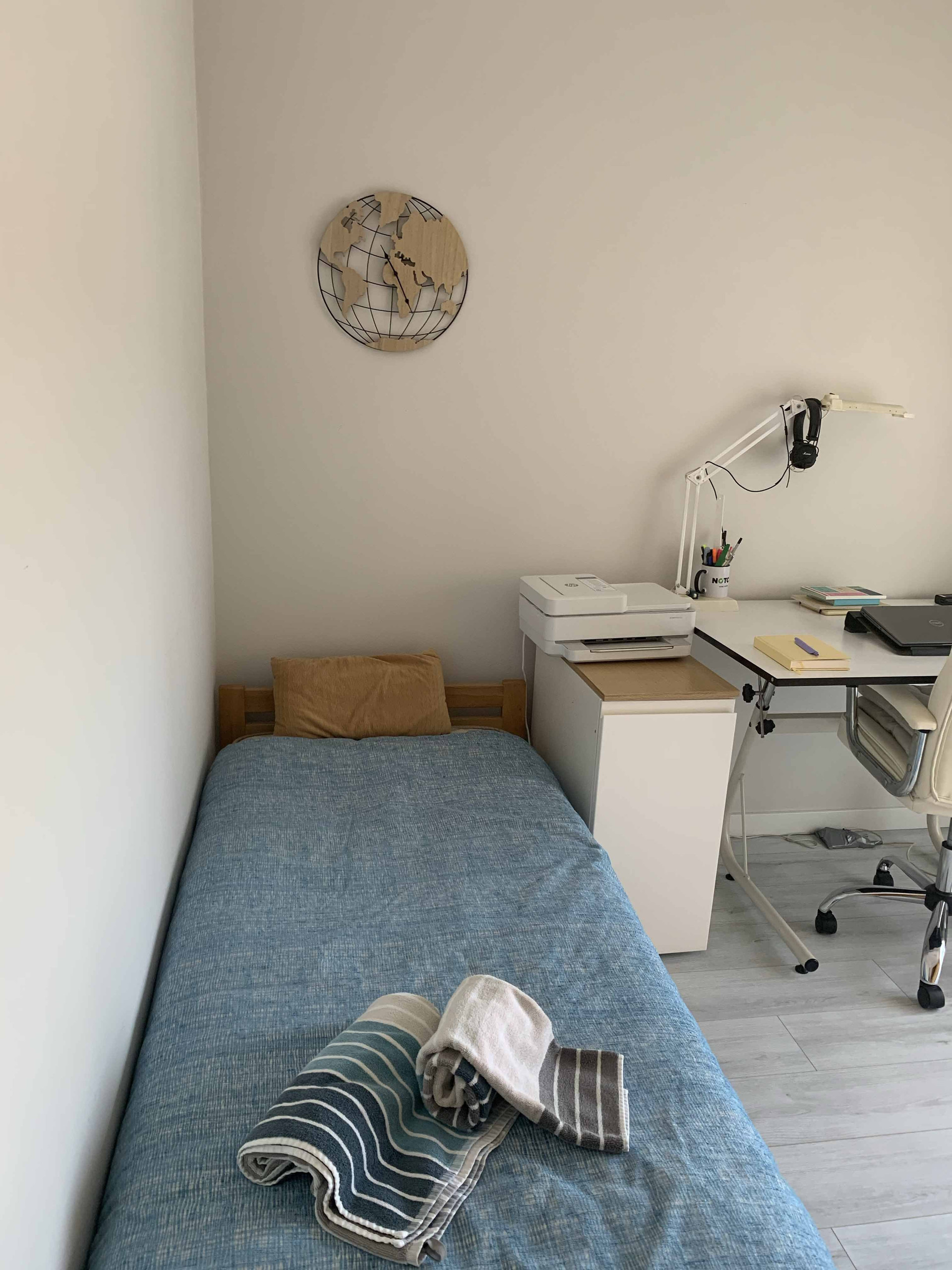 Bedroom with single bed and desk
