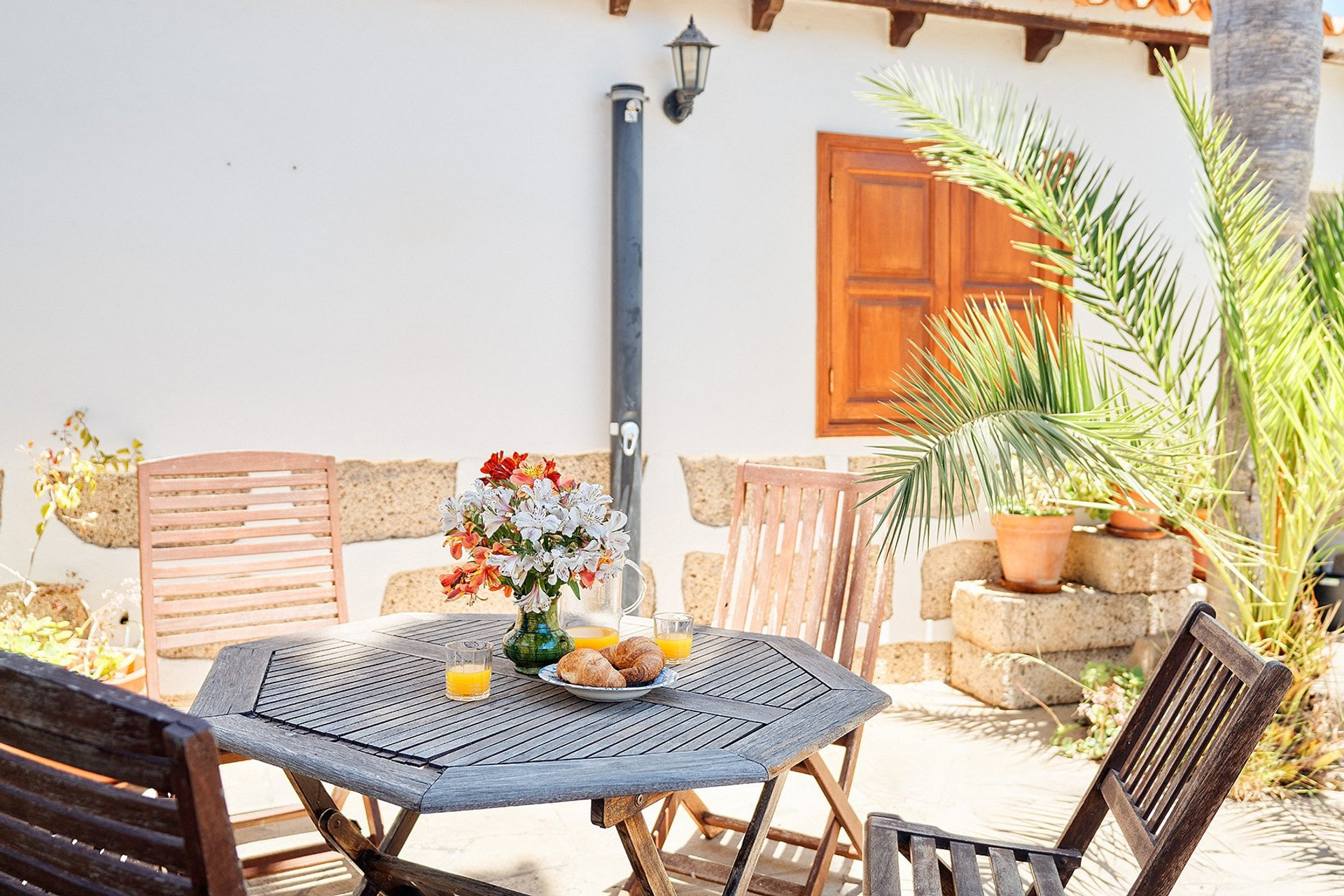 Patio dining table with flowers