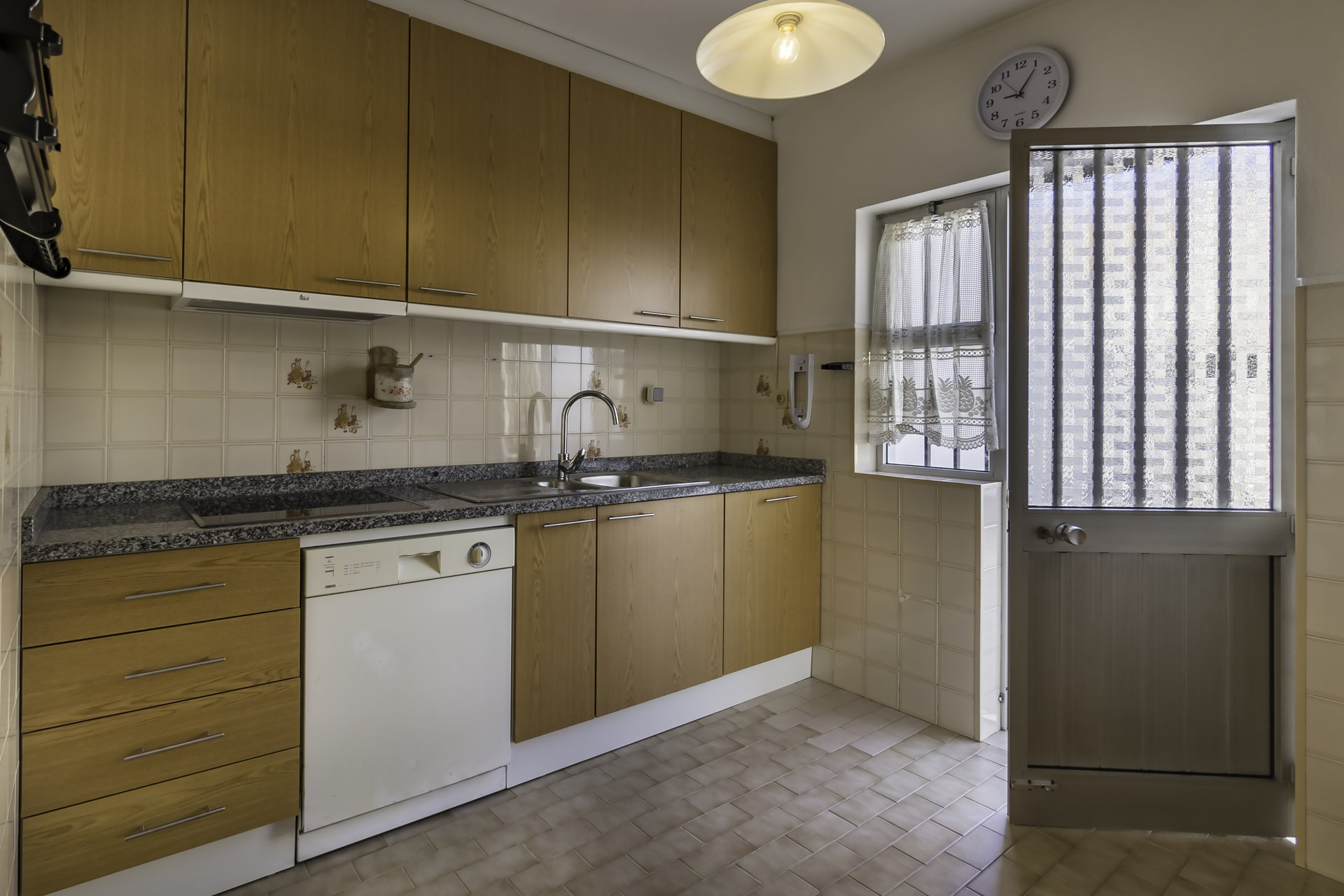 Kitchen with dishwasher and sink