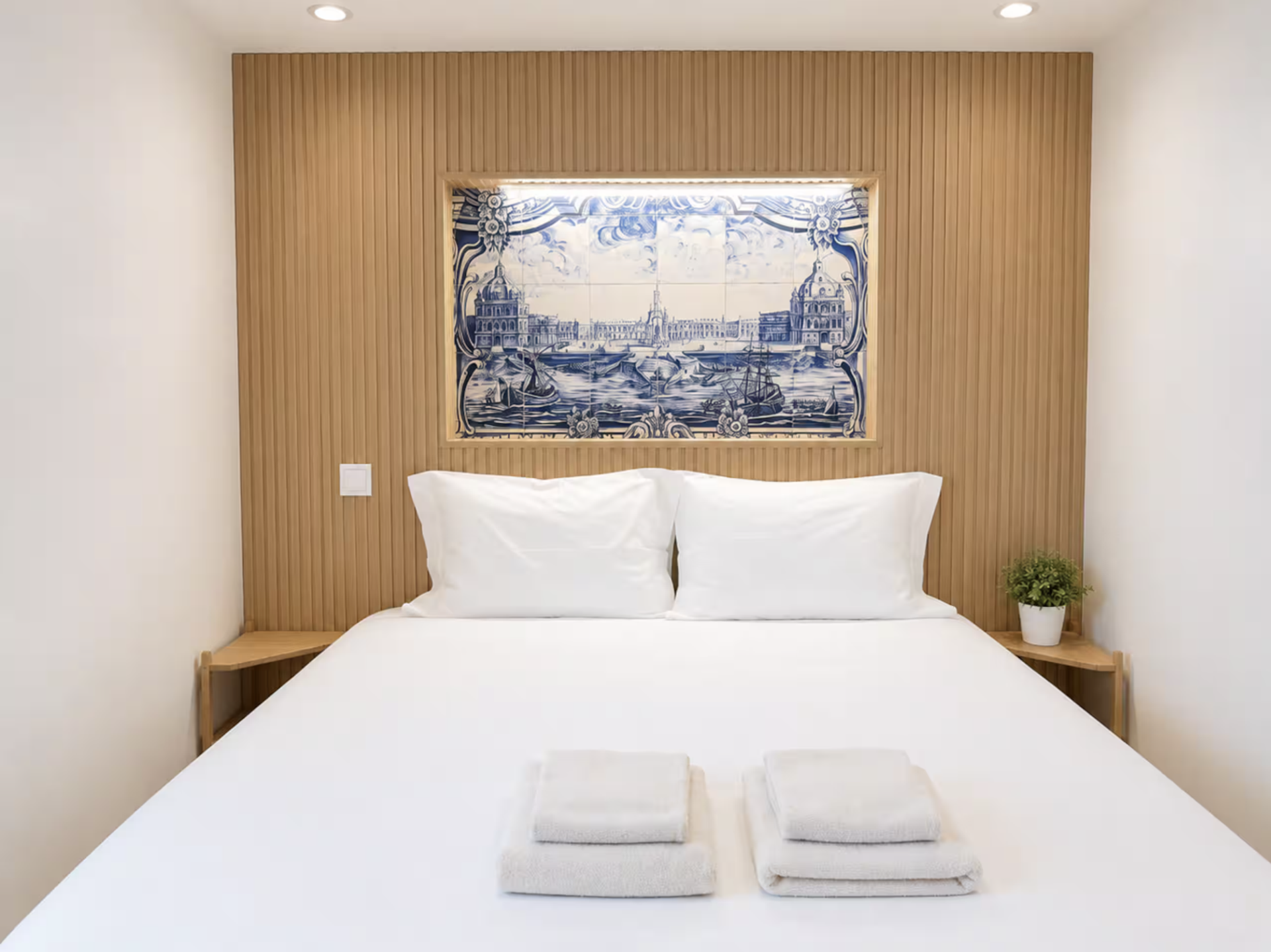 Bed with tile headboard panel