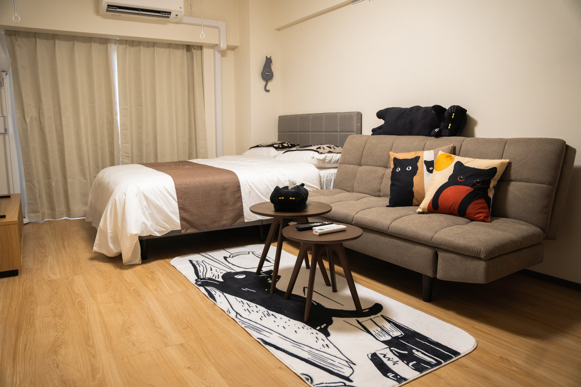 Living area with bed and sofa