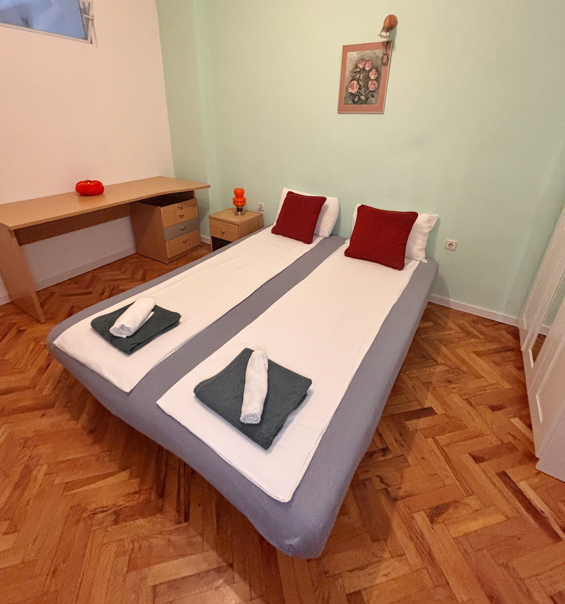 Bright bedroom with green walls