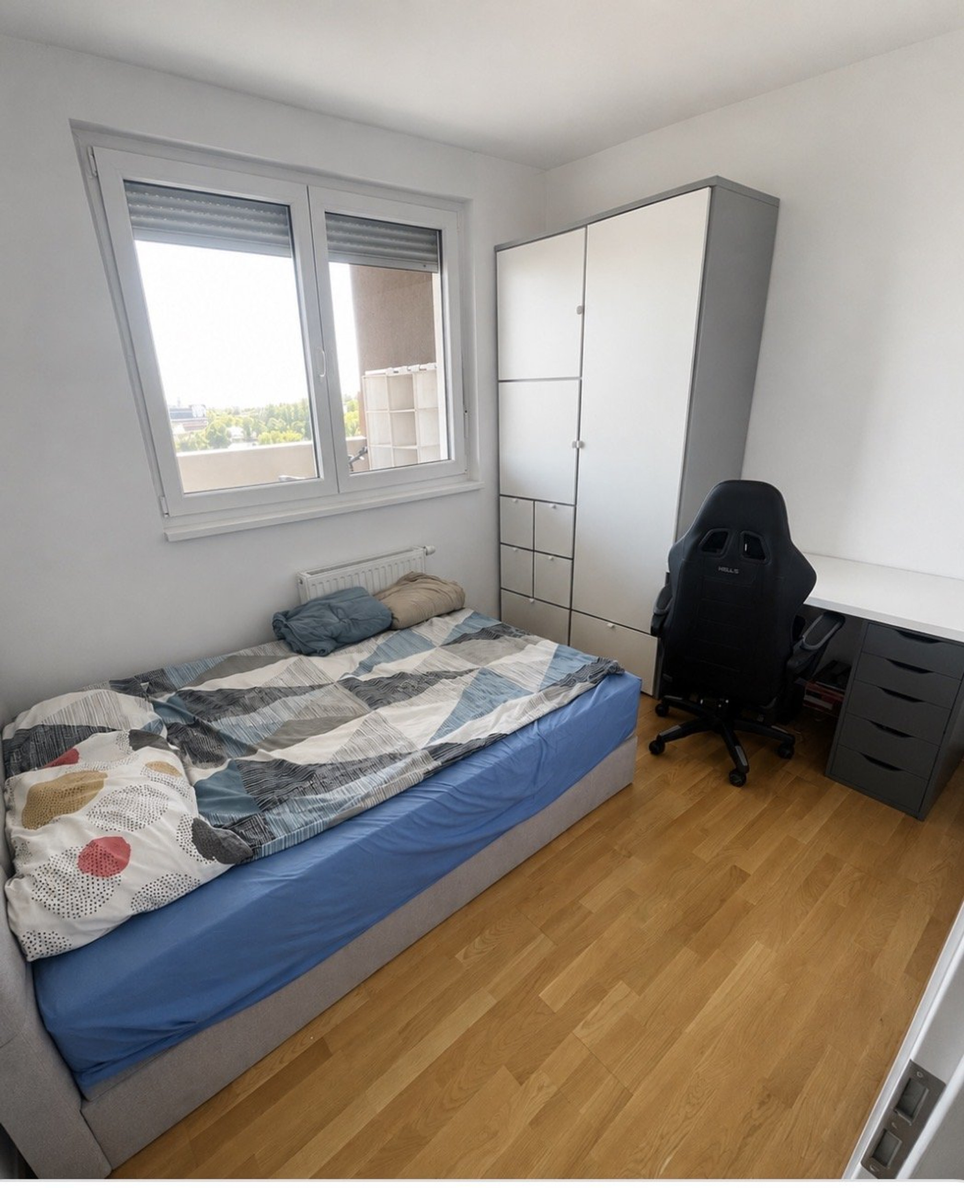 Bedroom with wardrobe and desk
