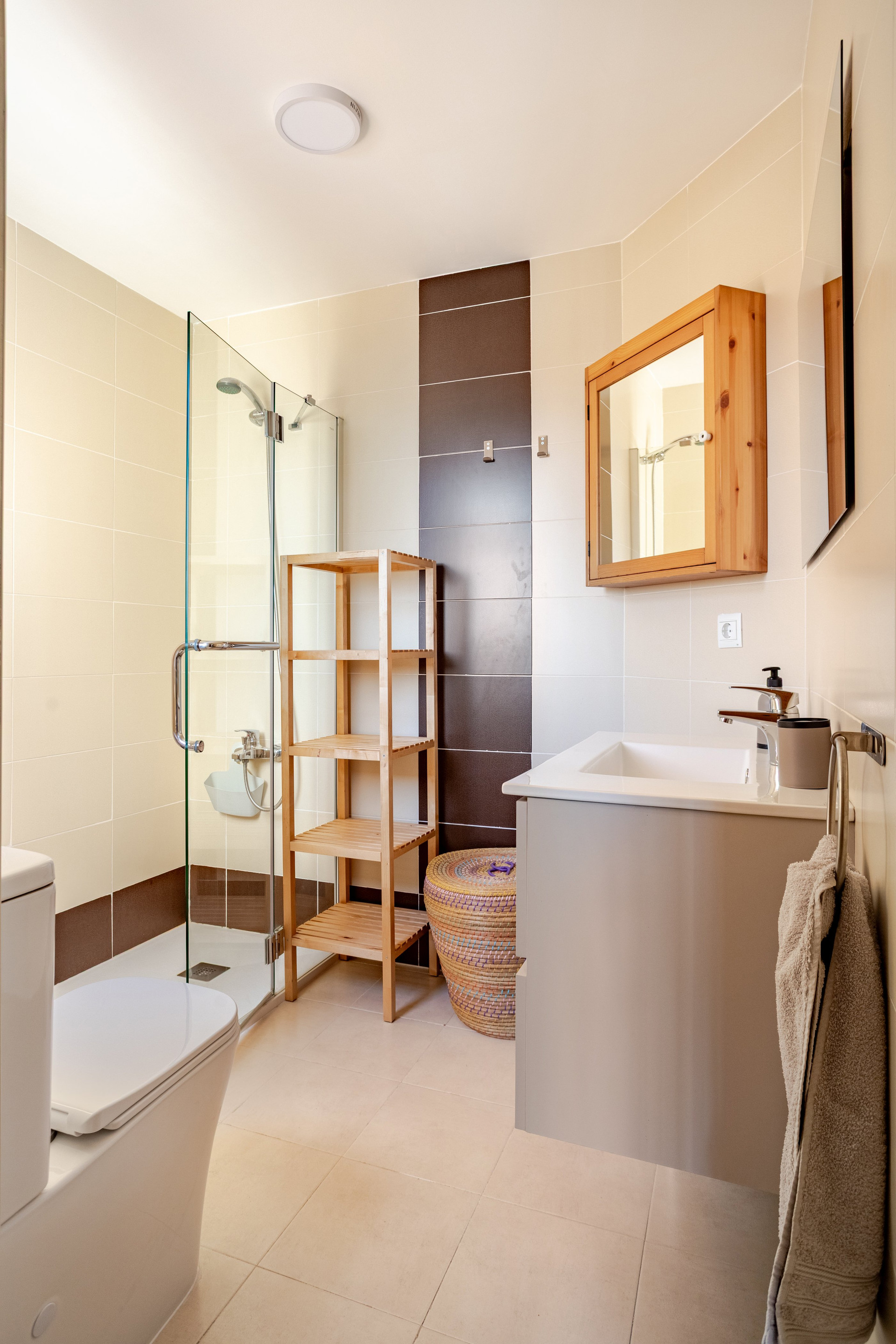 Full bathroom with shower and vanity