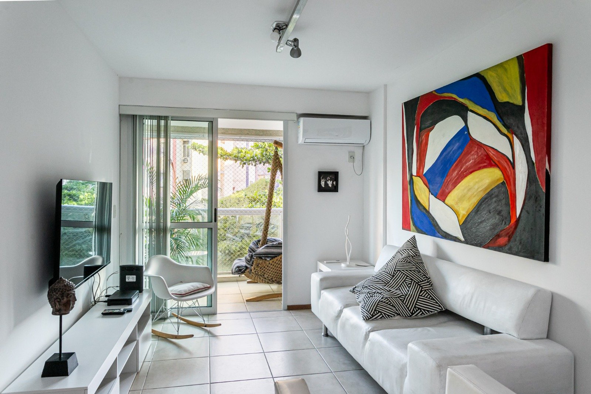 Bright living room with balcony access