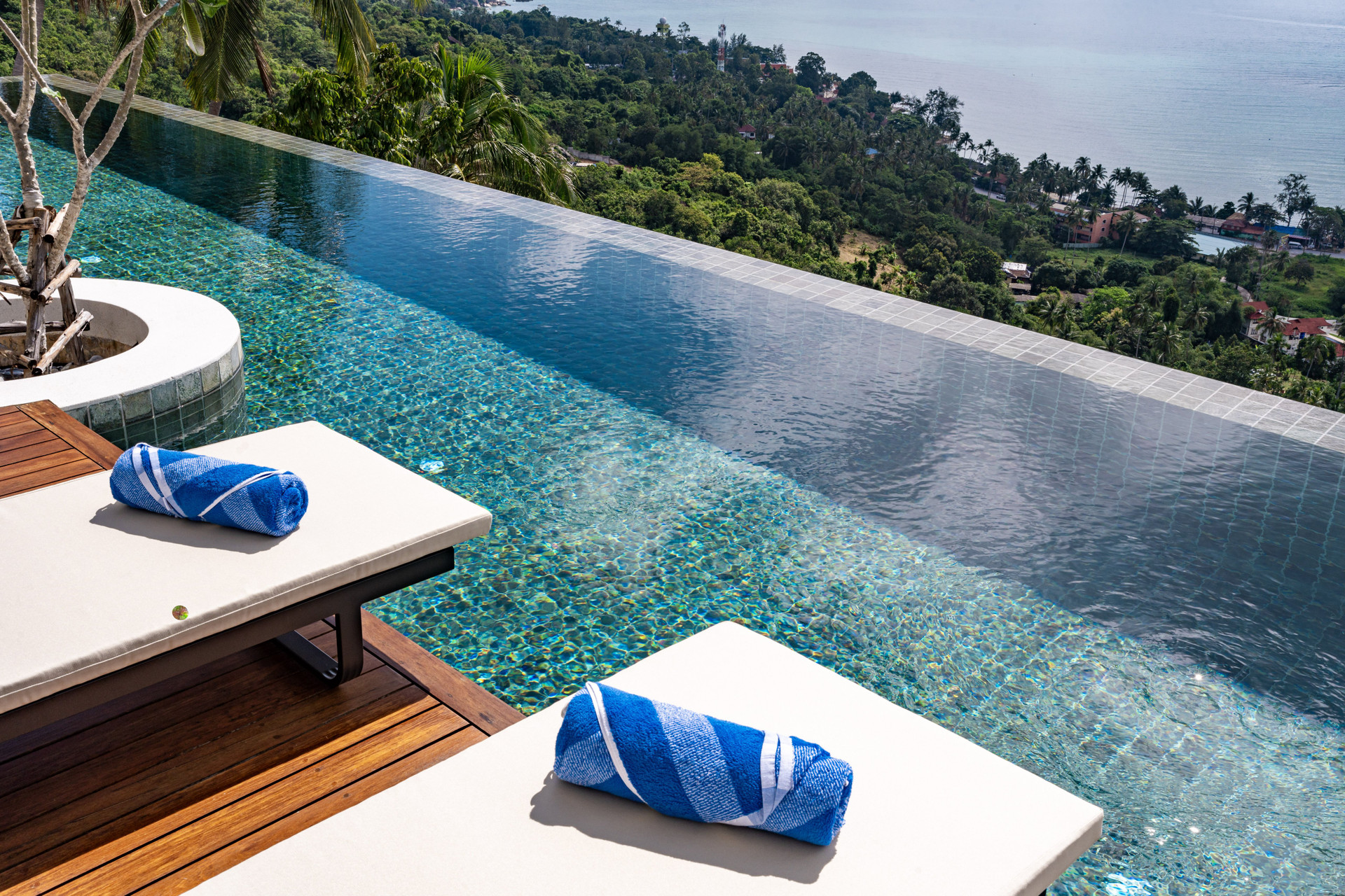 Private Swimming Pool: Dive into the panoramic sea view from your private pool, a space designed for unhurried time and dwelling in the present moment.