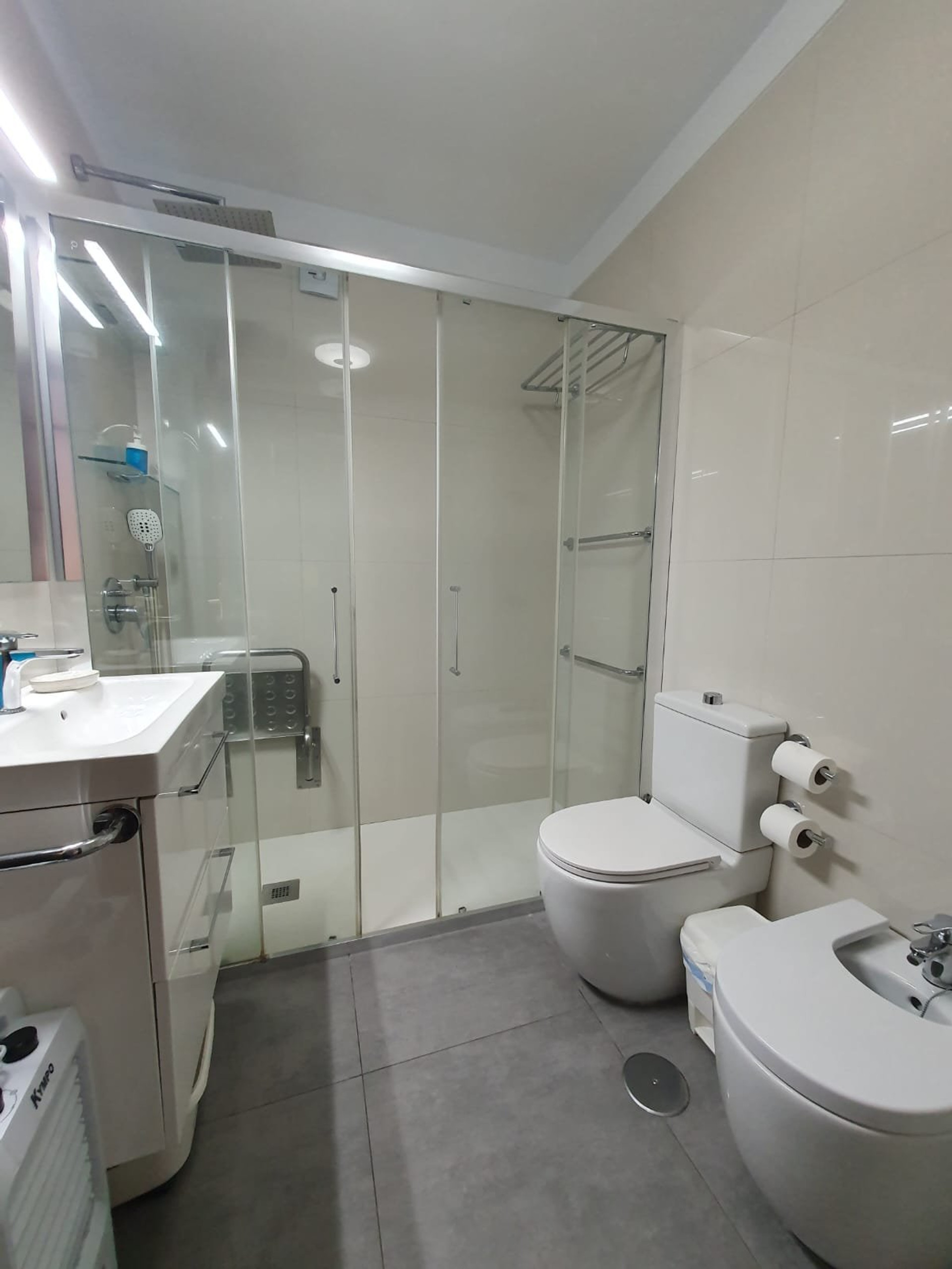Bright bathroom with glass shower