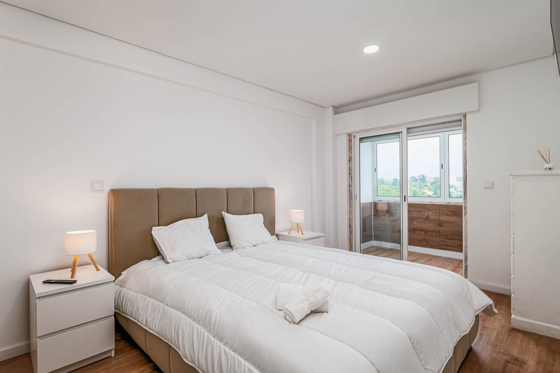Master bedroom with double bed balcony