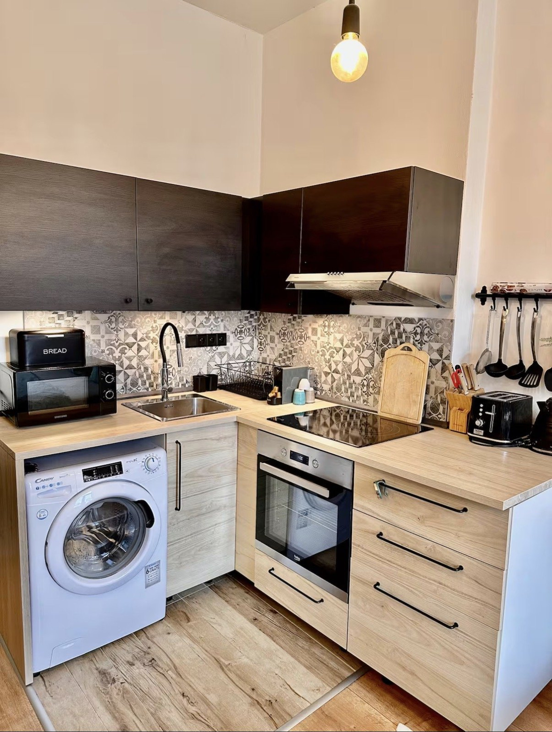 Full kitchen dark cabinets wood counters