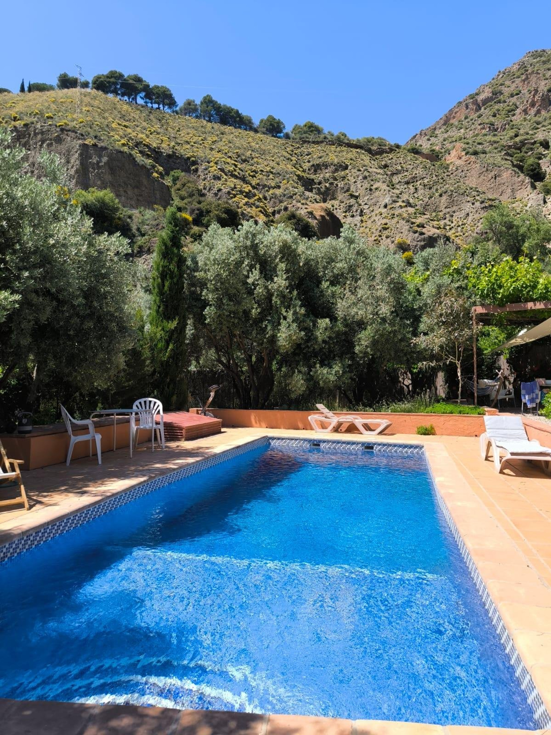 Pool surrounded by hills