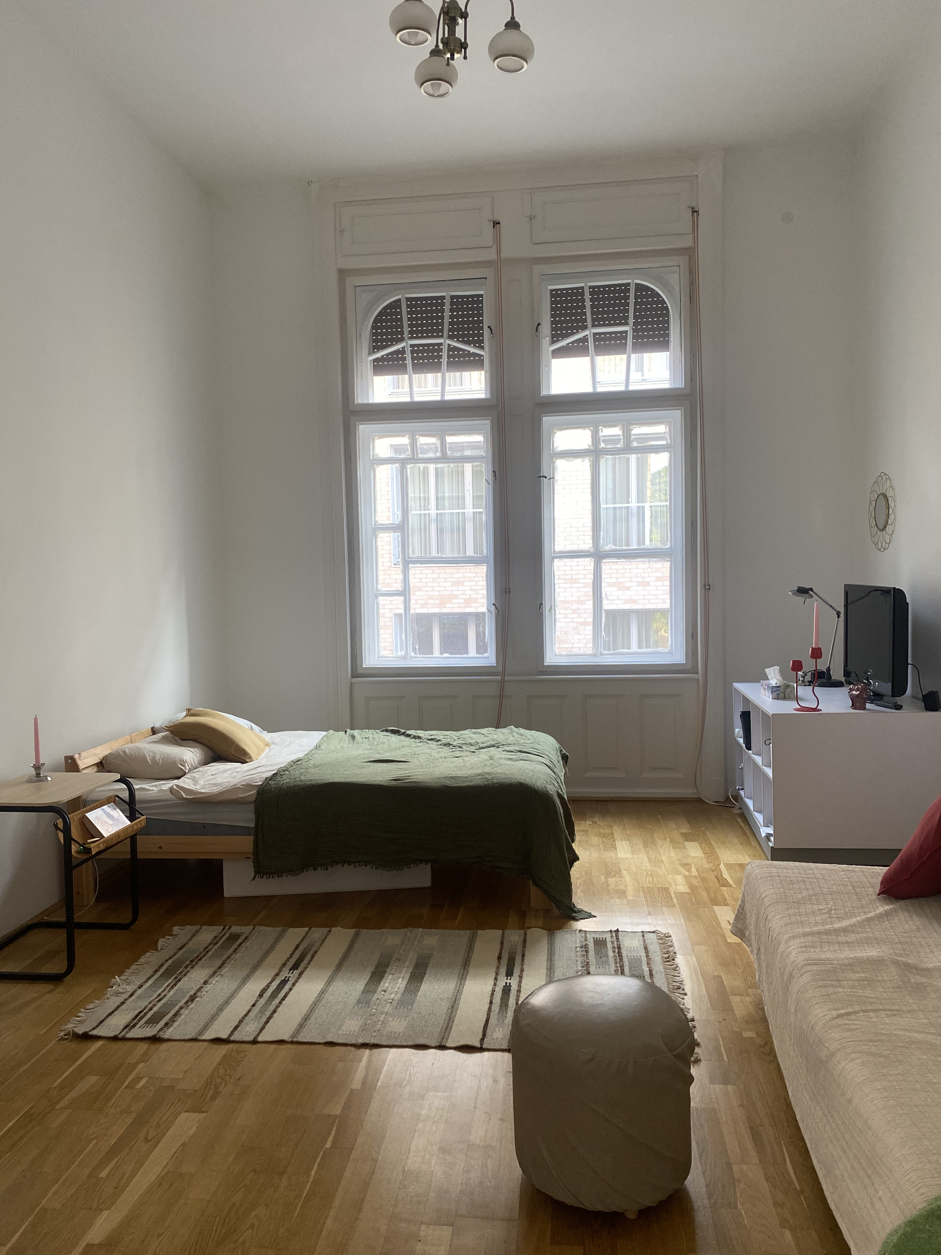 Bright studio room with large windows
