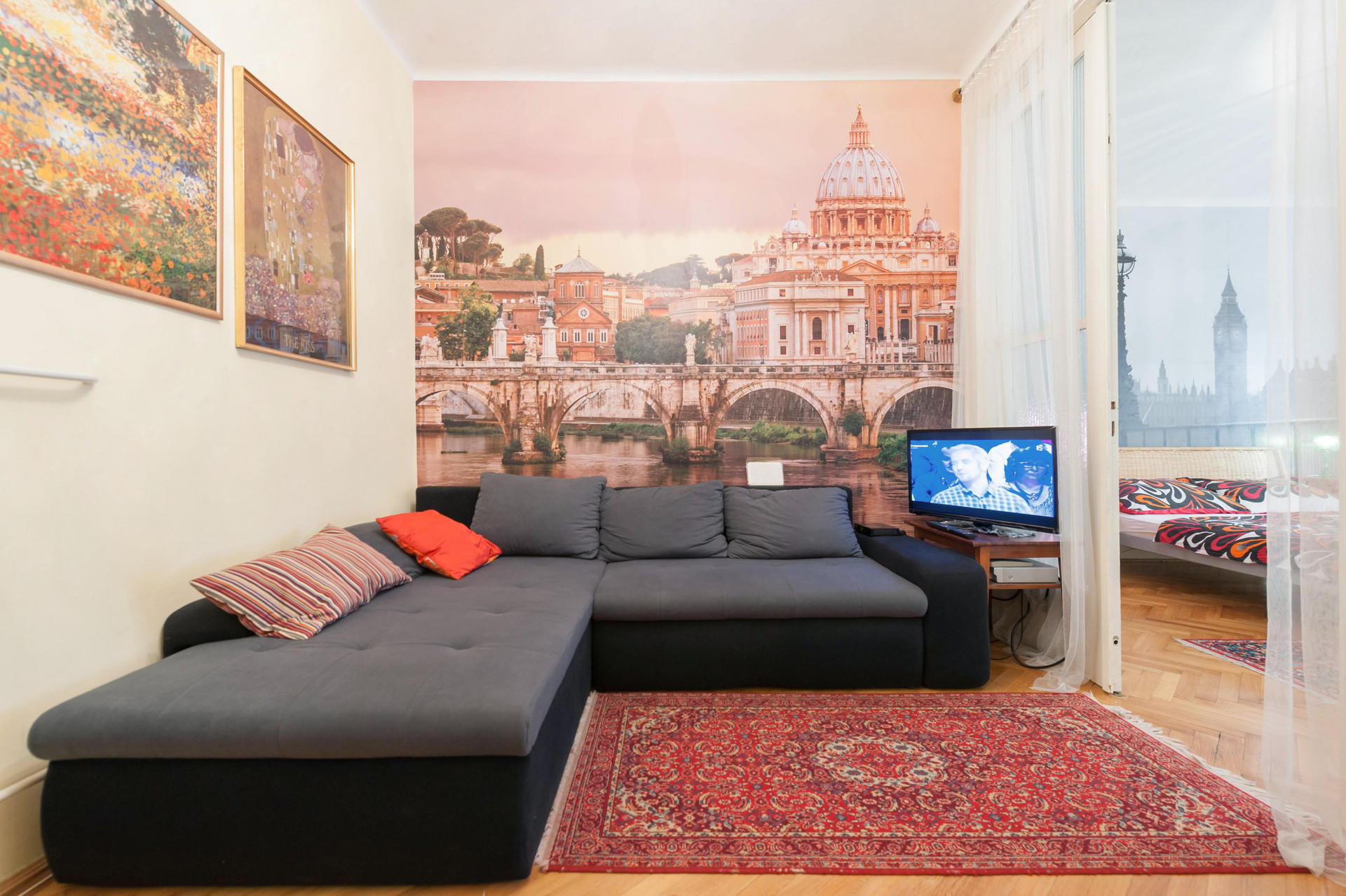 living room with tv and sofa bed