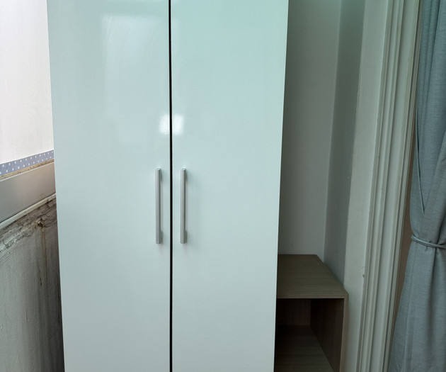White wardrobe with shelf