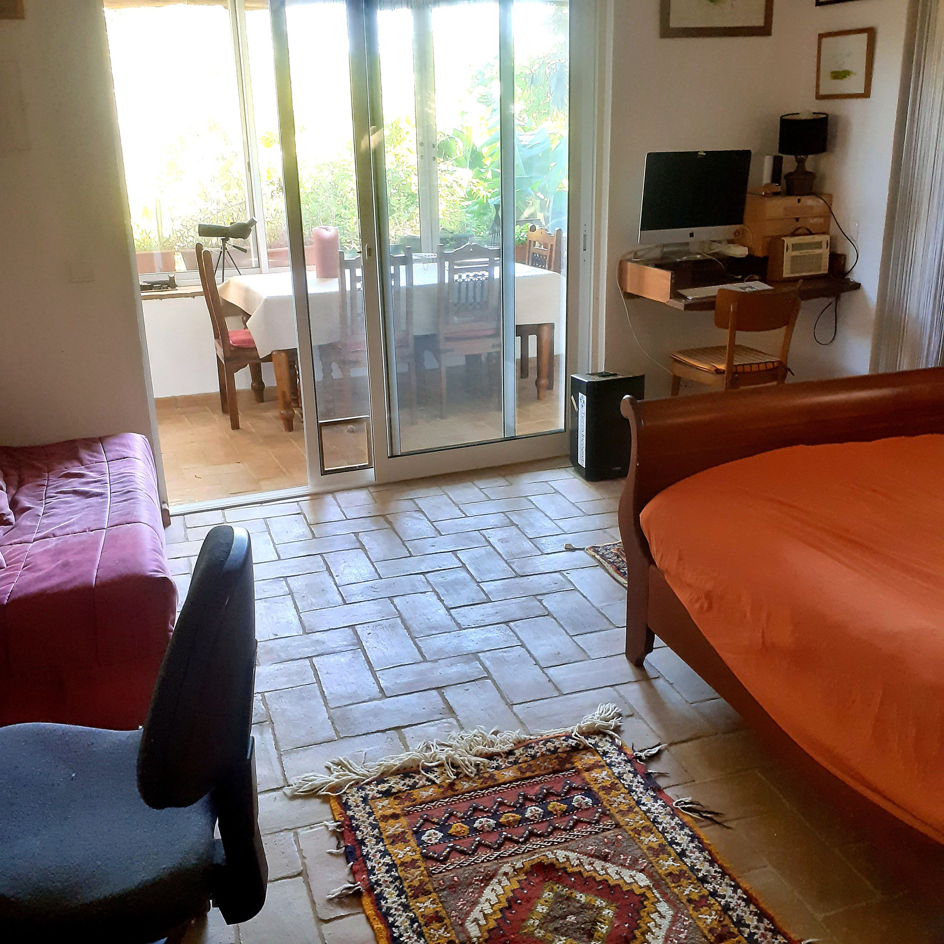 Bedroom with dining view outside
