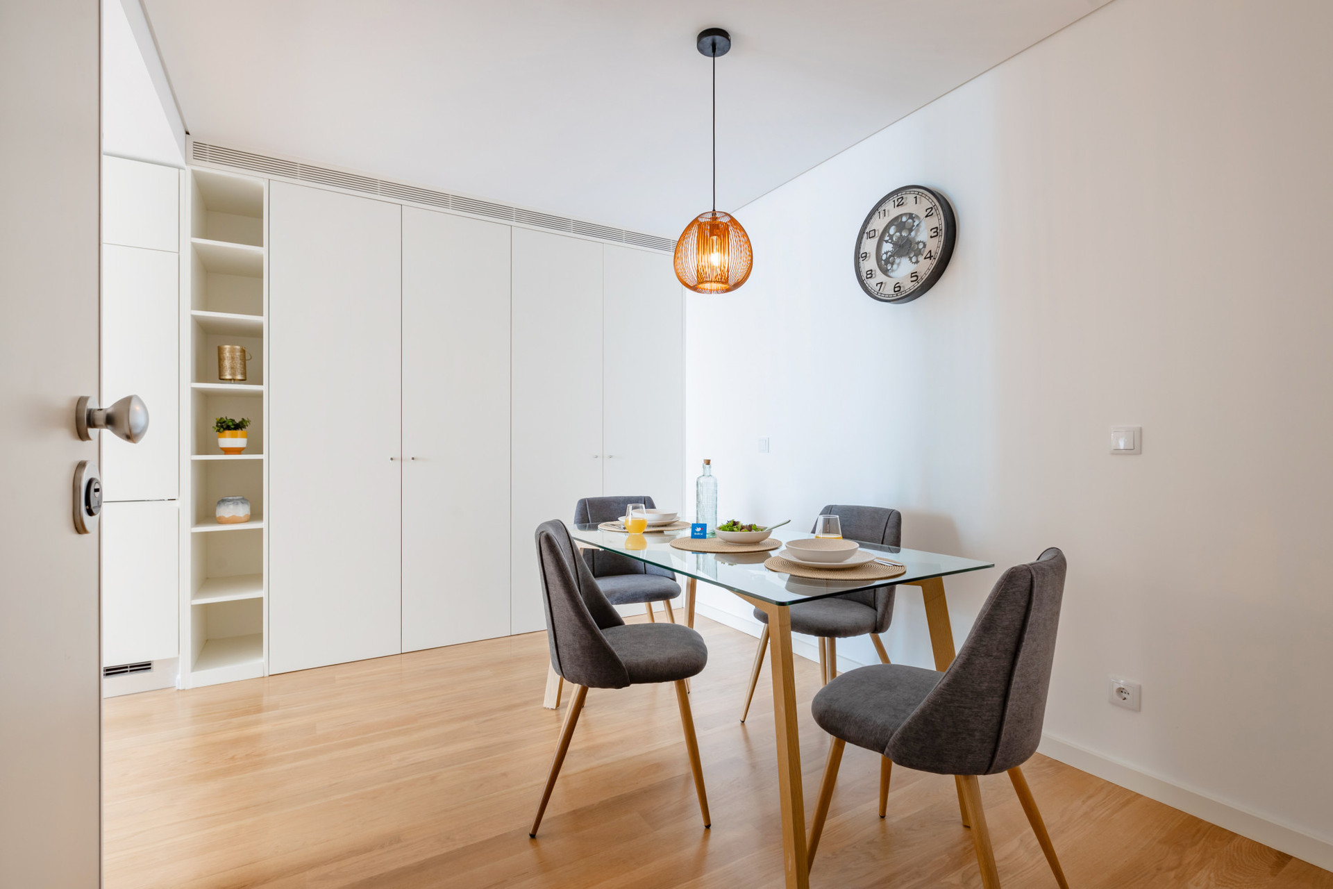 Dining Area with a table for 4 and plenty of storage area.