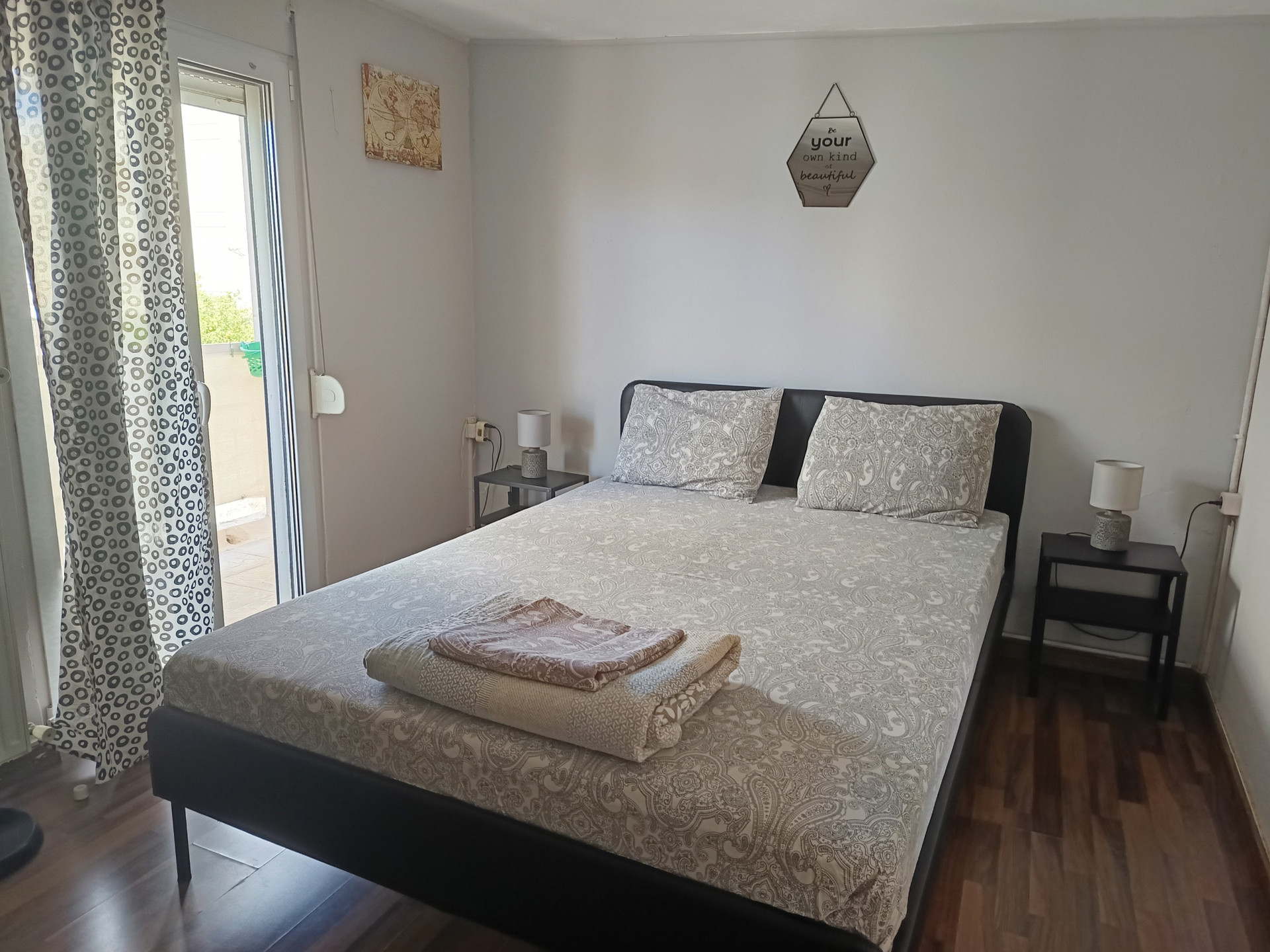 Bedroom with double bed balcony