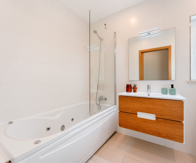 Bathtub with shower attachment
