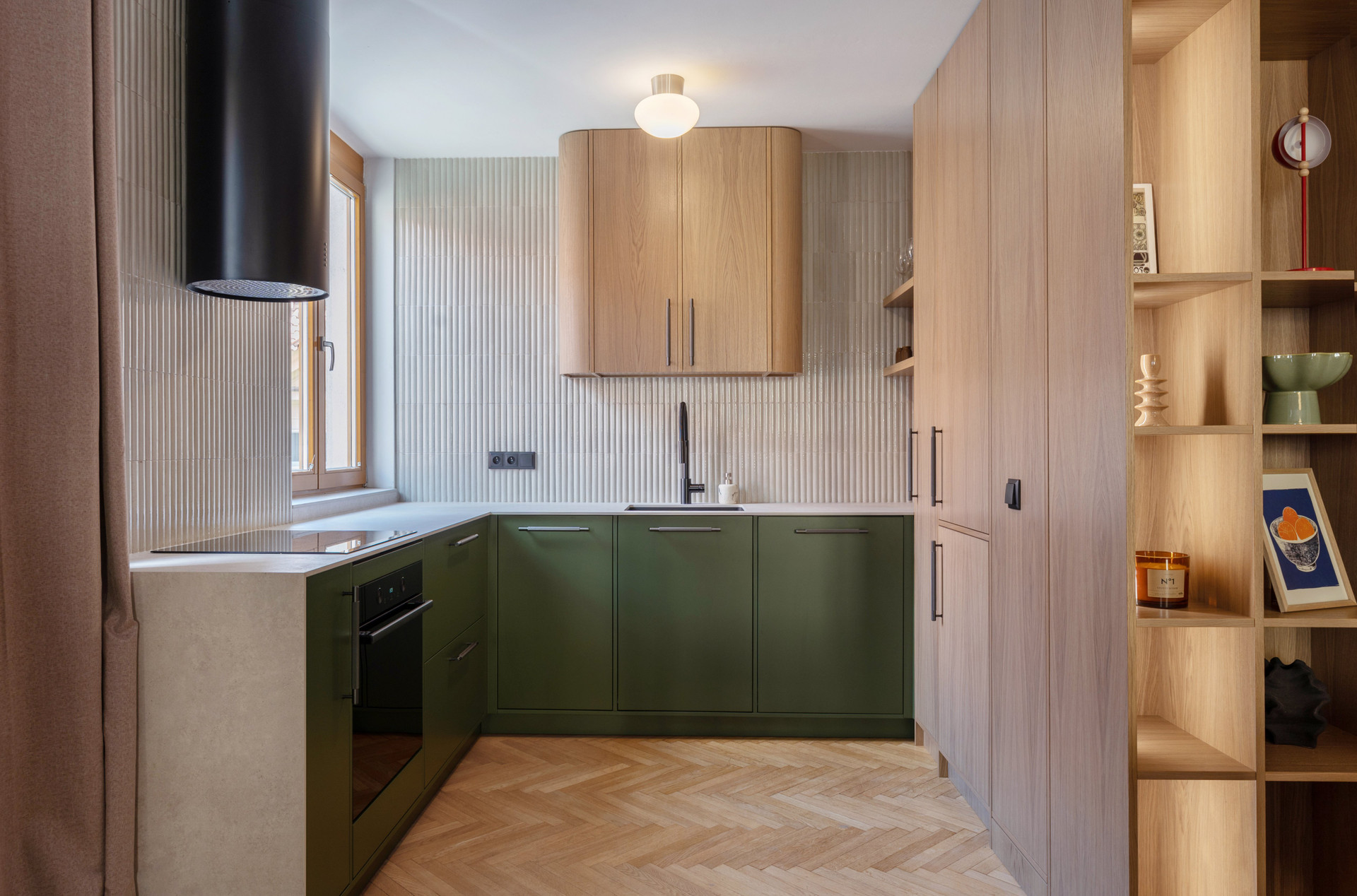 Green kitchen with wood cabinetry