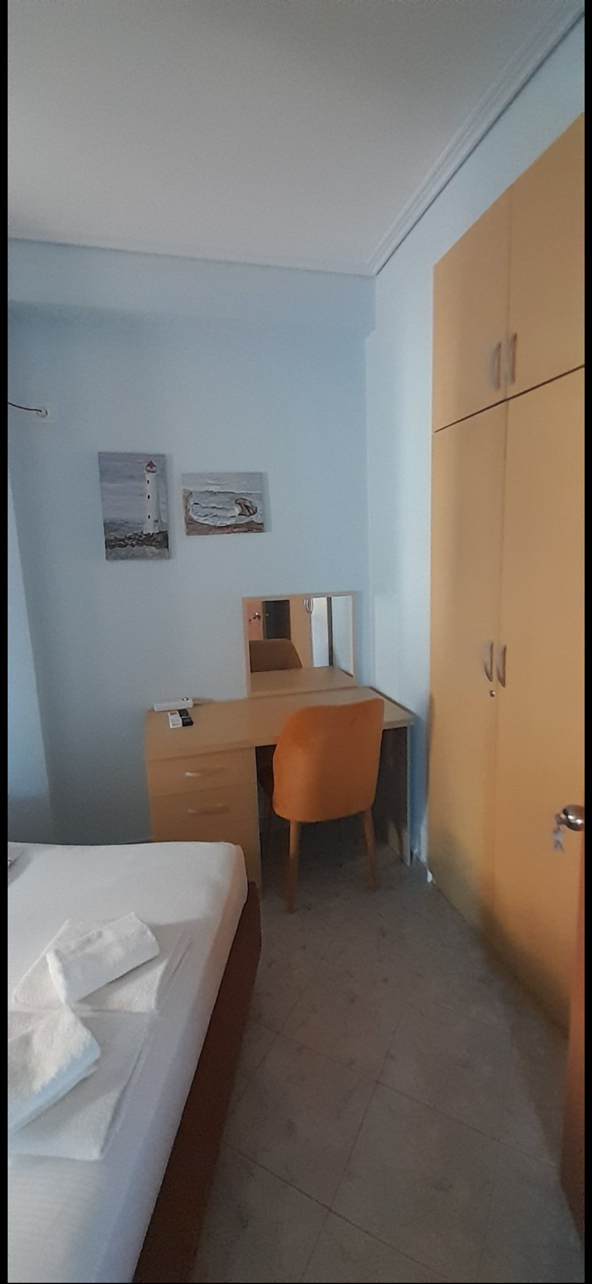 Bedroom with desk and wardrobe
