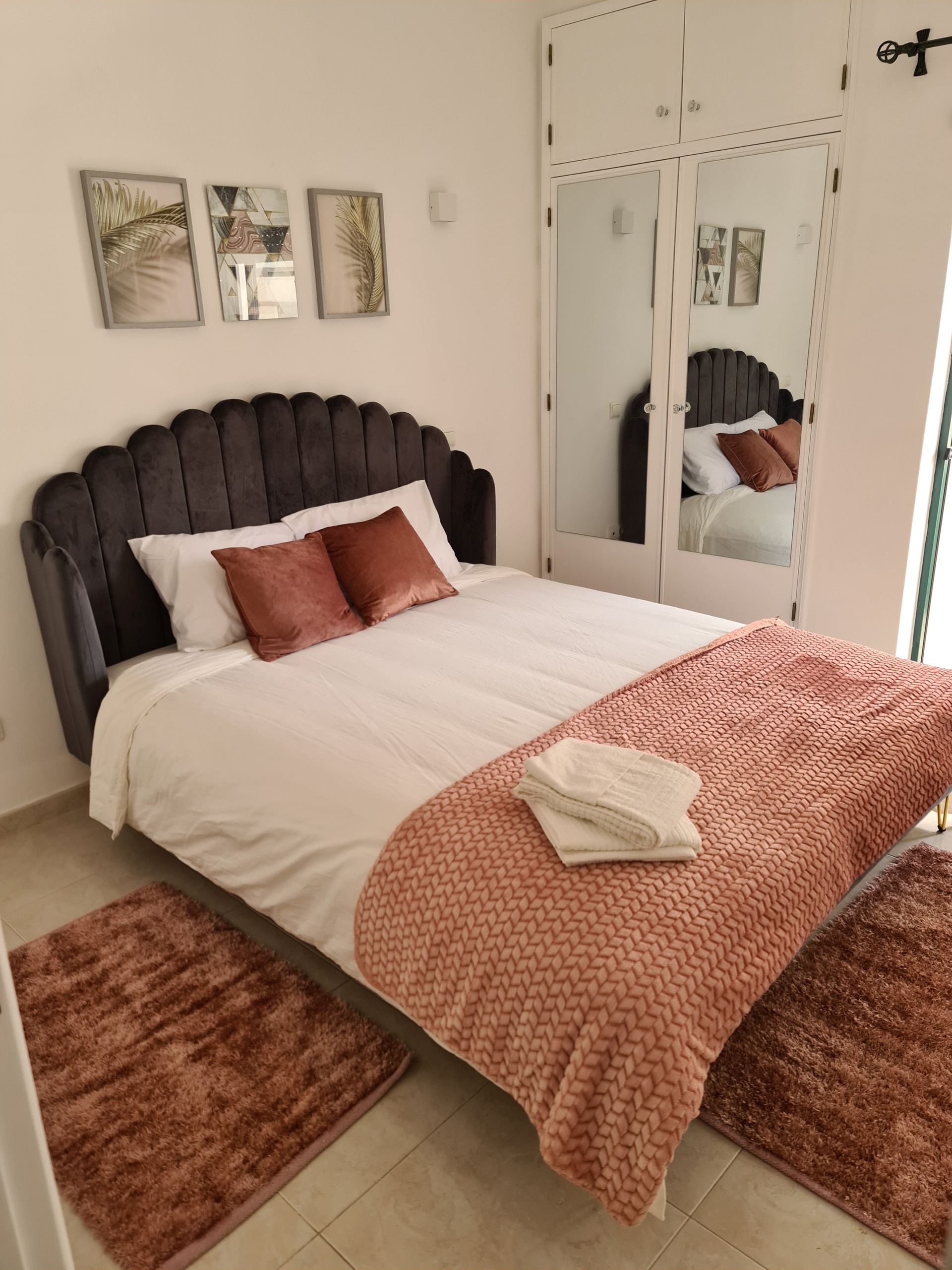 Bedroom with pink bedding