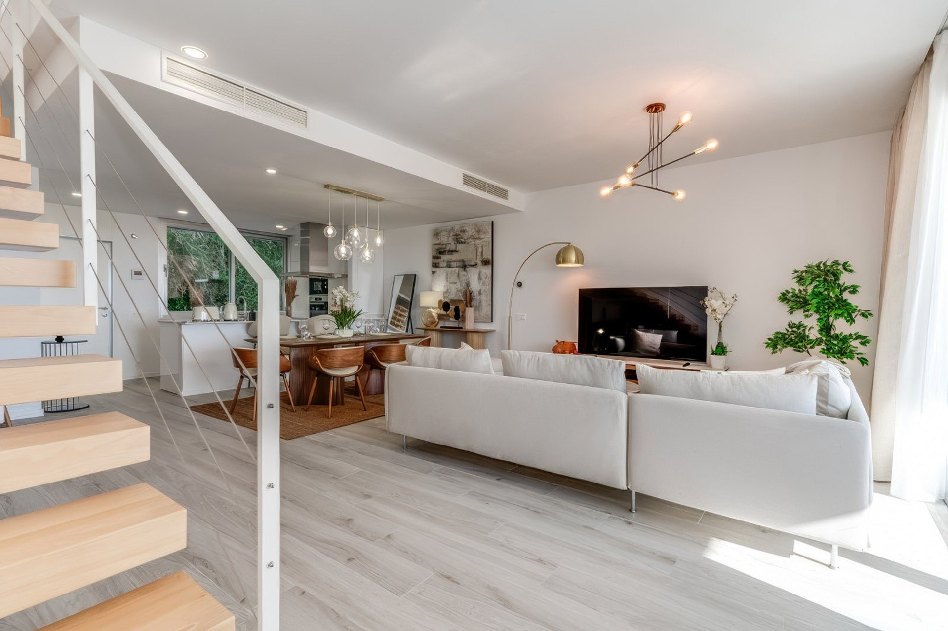 Open living area with staircase