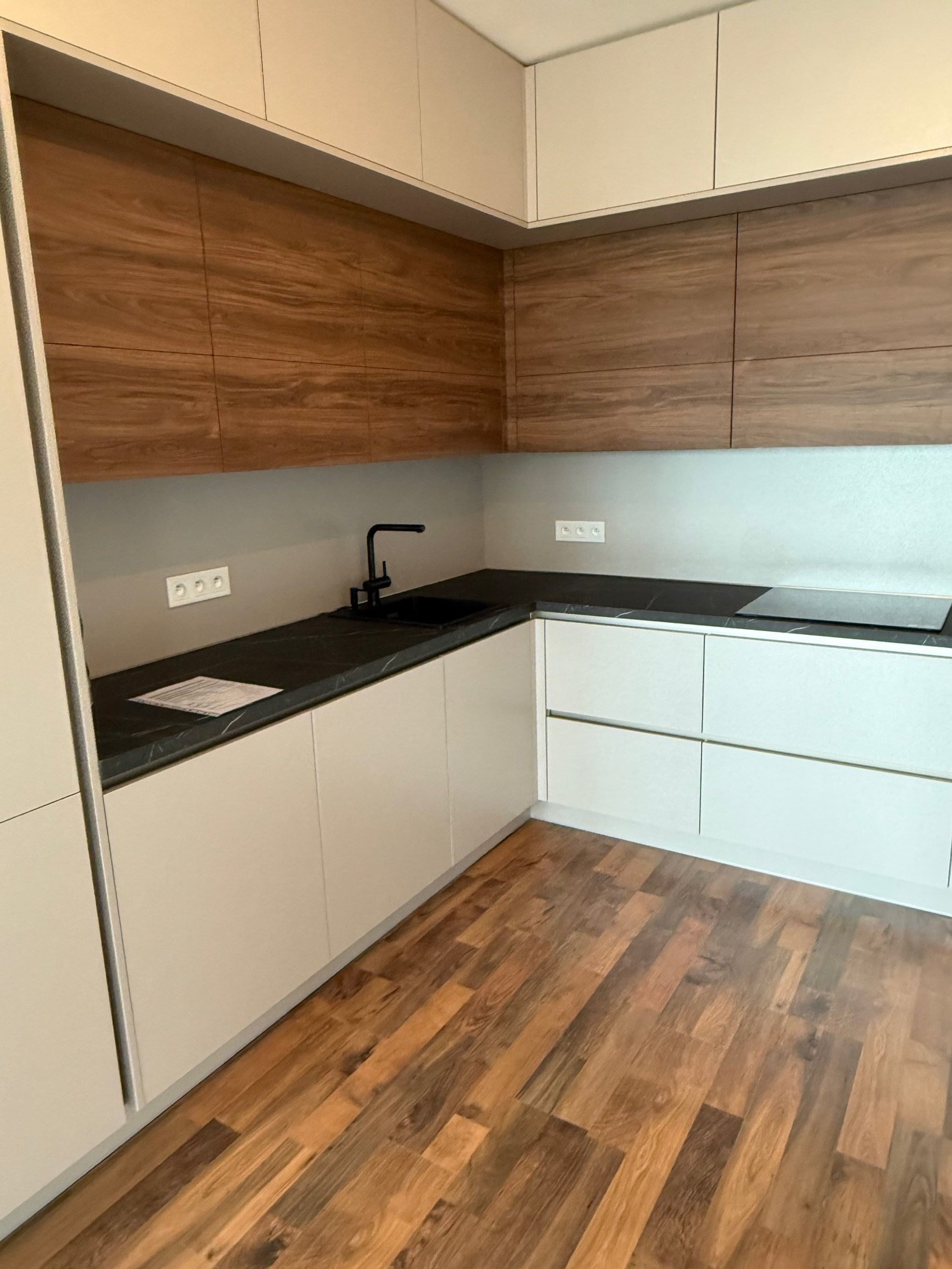 Kitchen cabinetry and wood accents