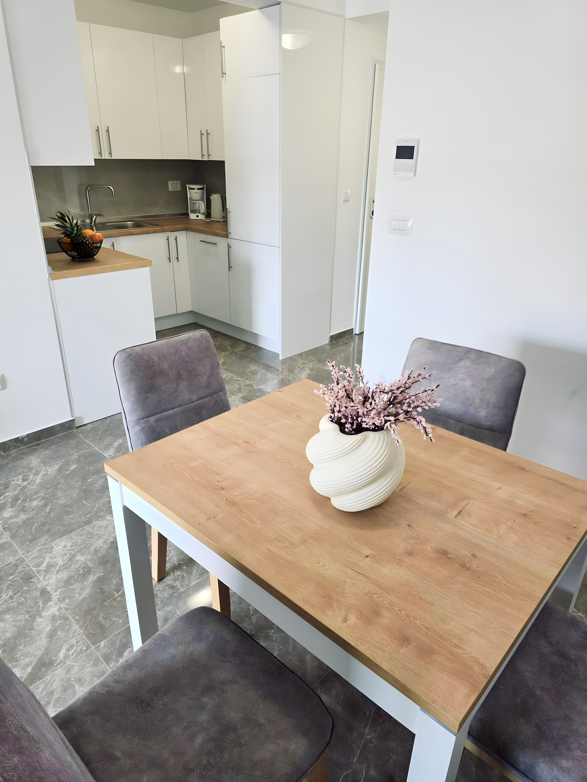 Dining table with kitchen view