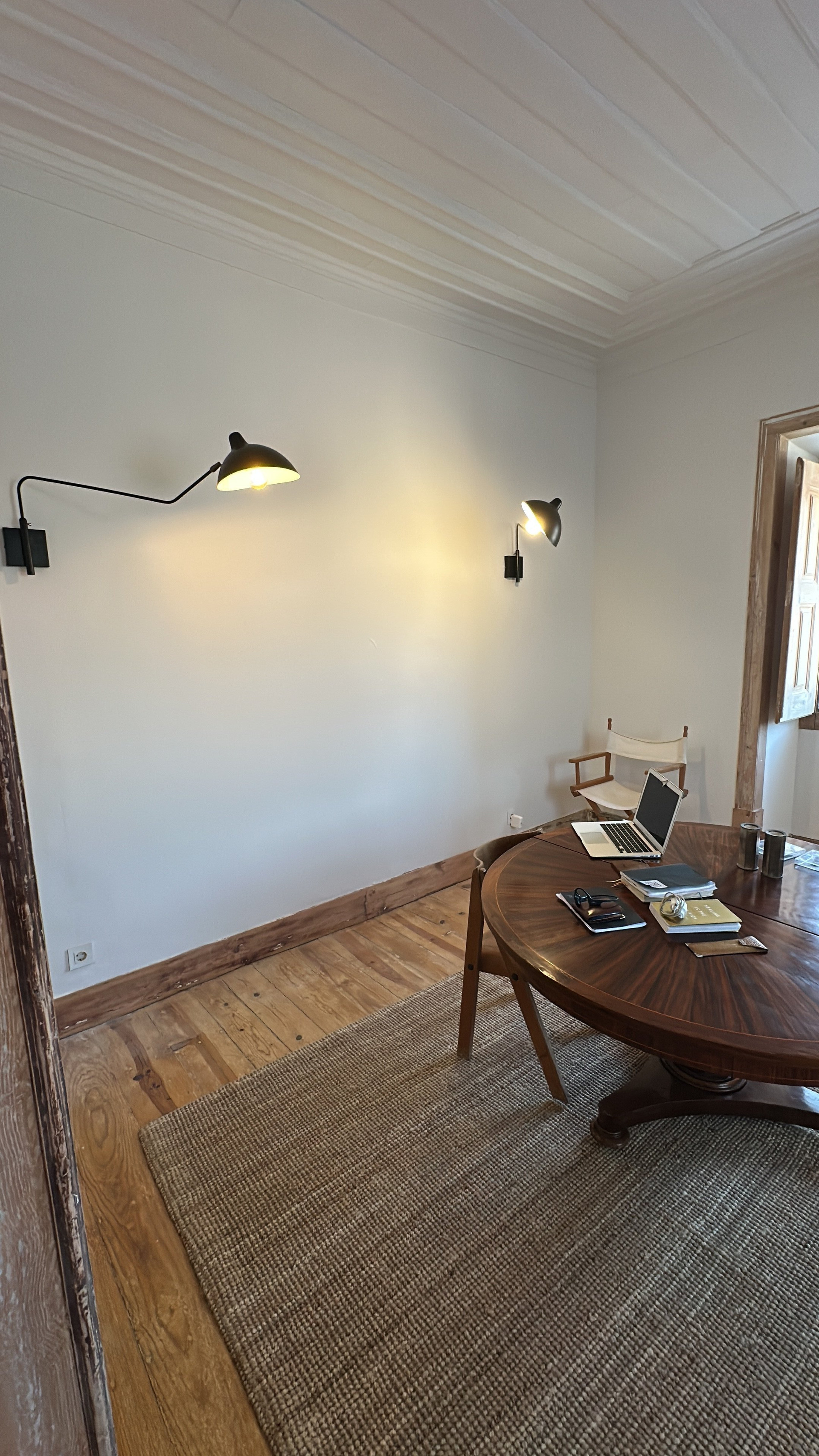 Living area with wooden table and lamps