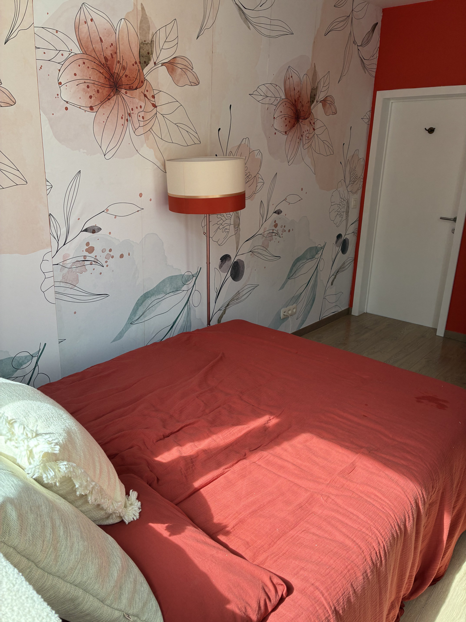 Double bed floral feature wall