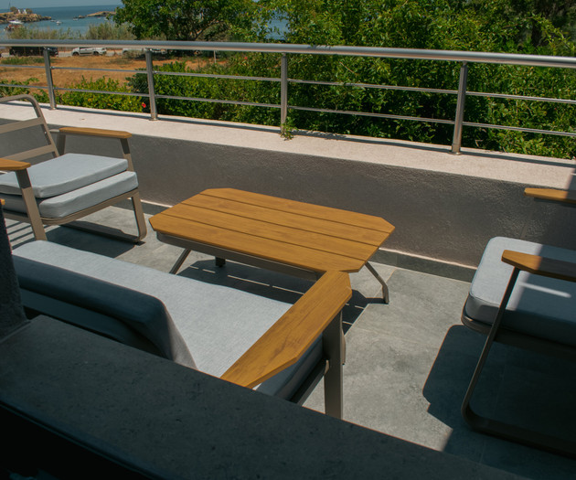 Balcony lounge with sea glimpse