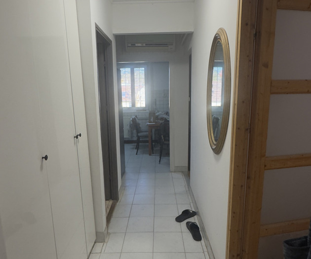 Hallway with wardrobes and mirror