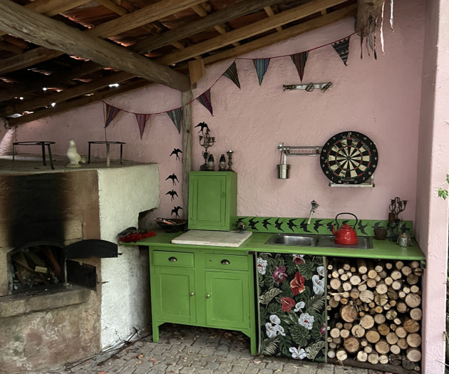 Outdoor kitchen with firewood