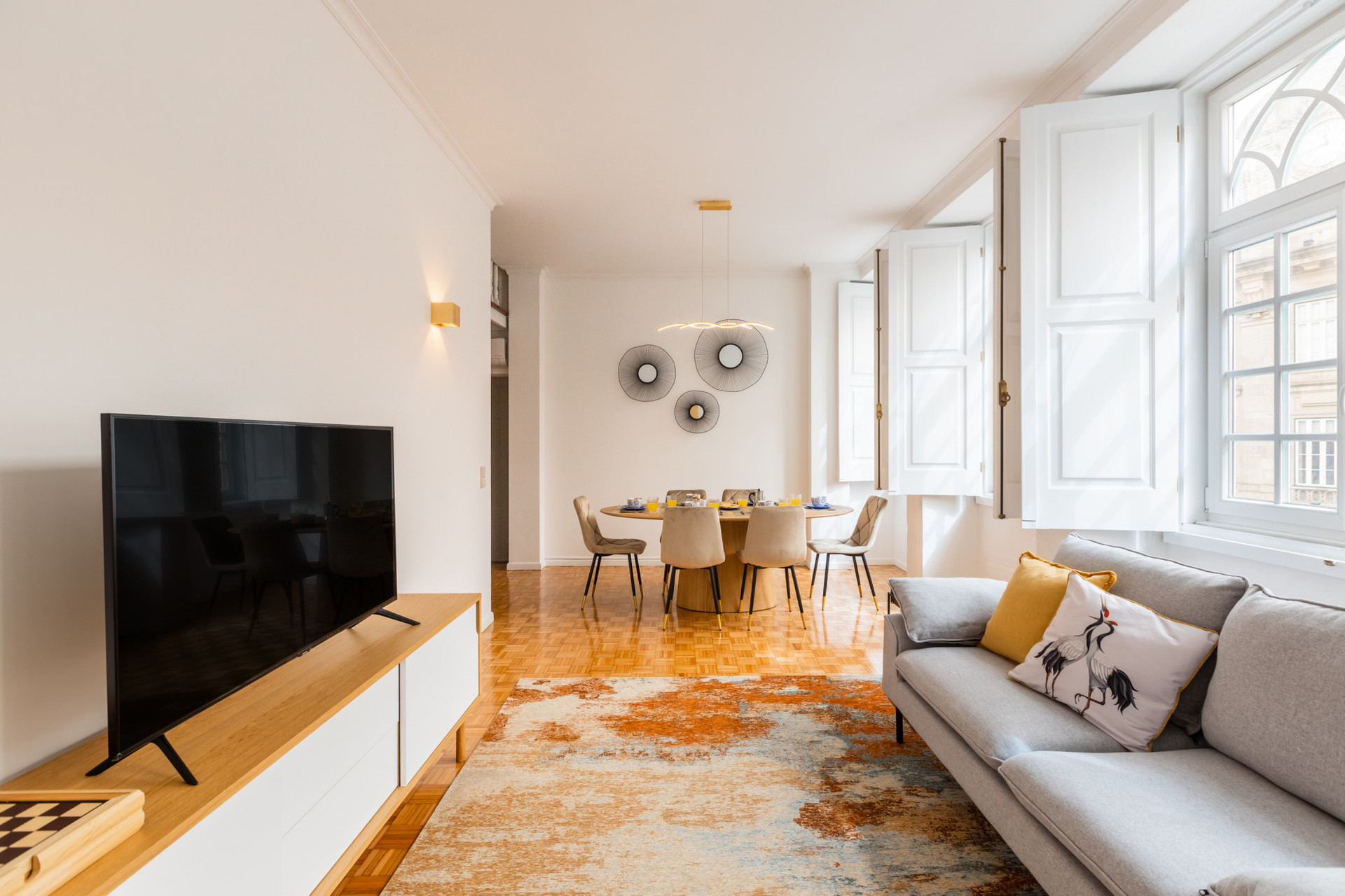 Living Room with Flat-Screen TV and Dining Table
