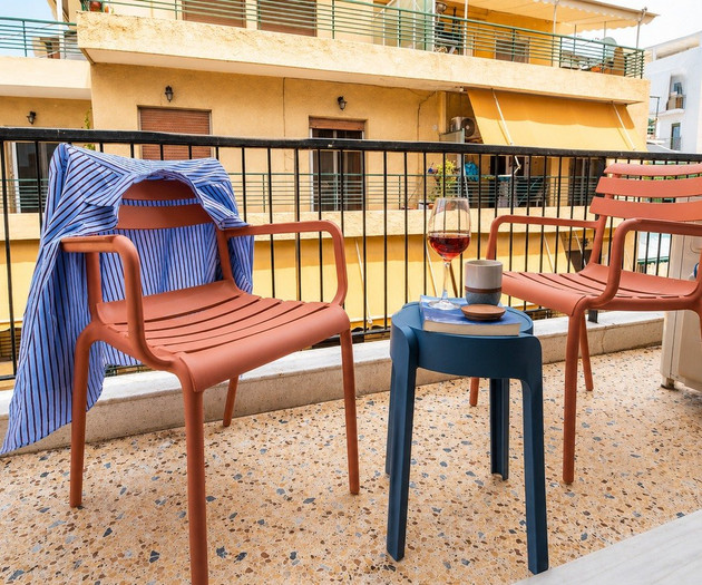 Balcony seating with wine