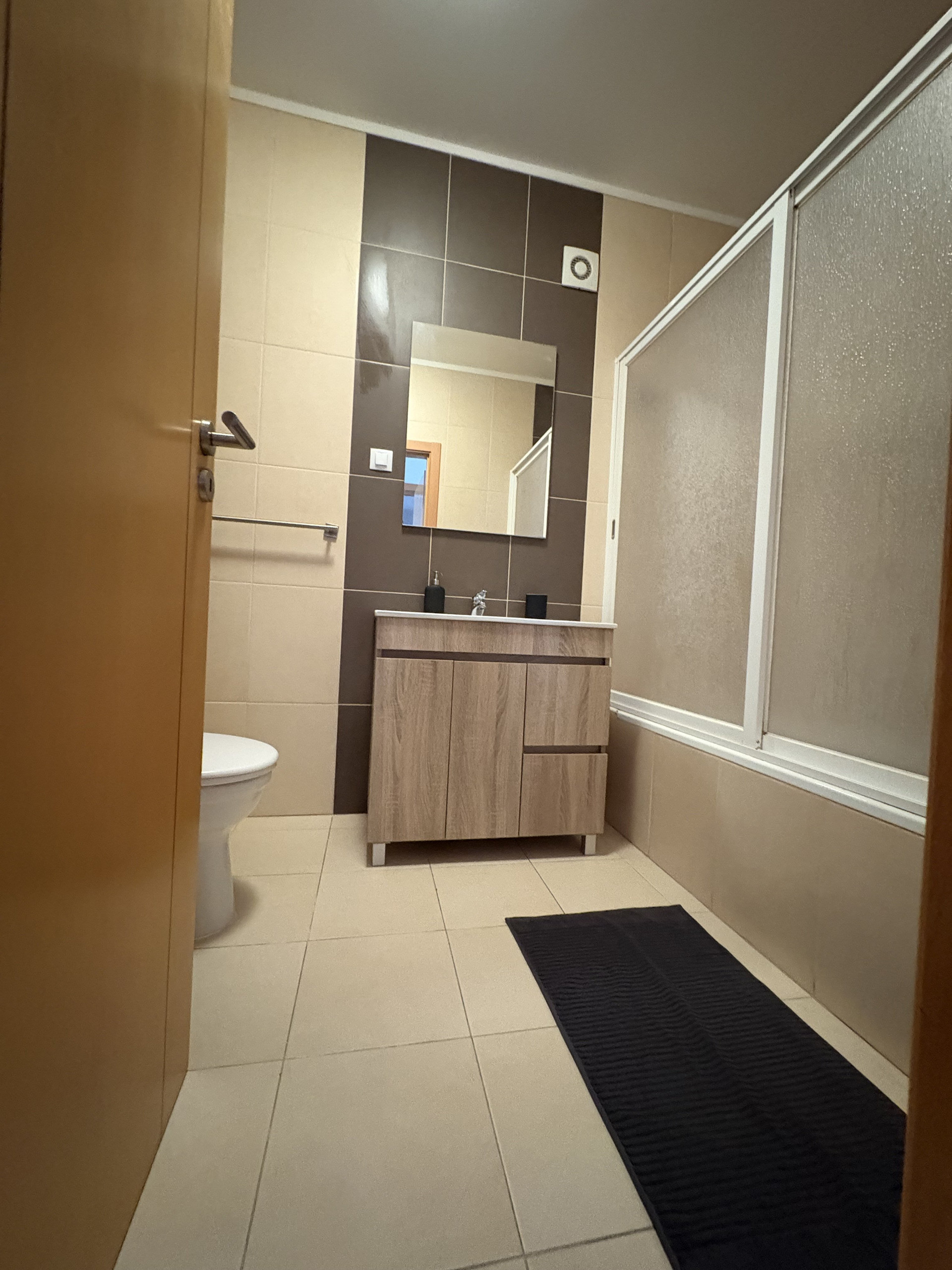 Bathroom with vanity mirror