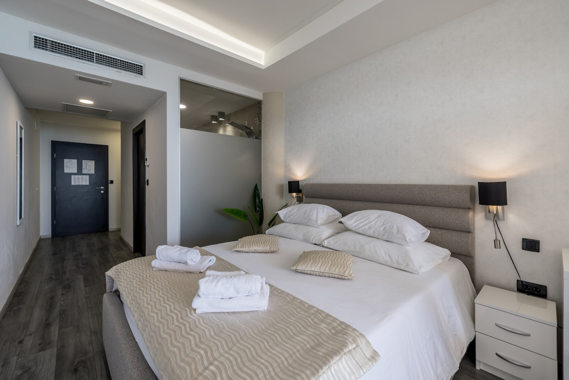Queen-size bed with nightstands.