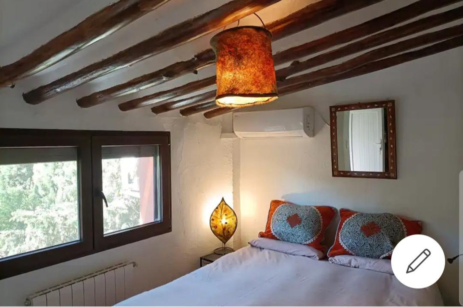 Bedroom with wooden beams