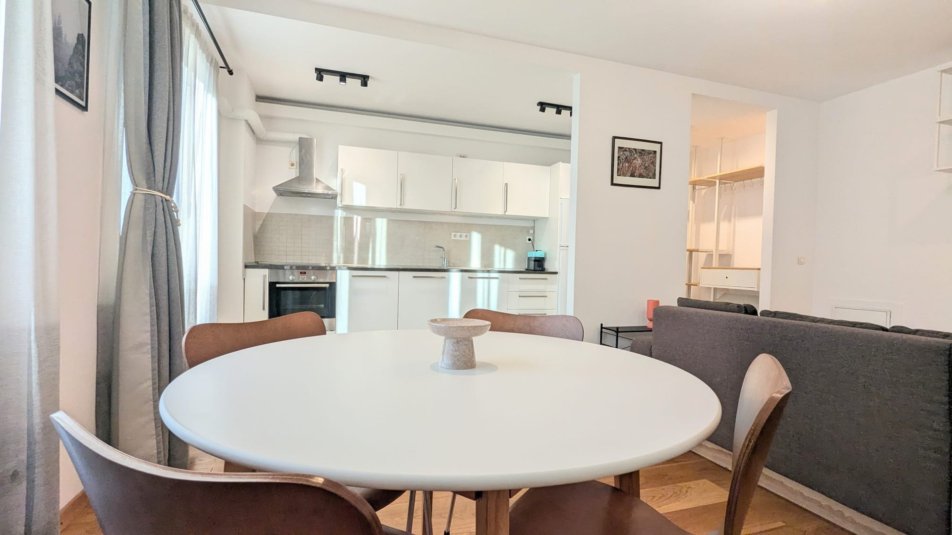 Dining area and white kitchen
