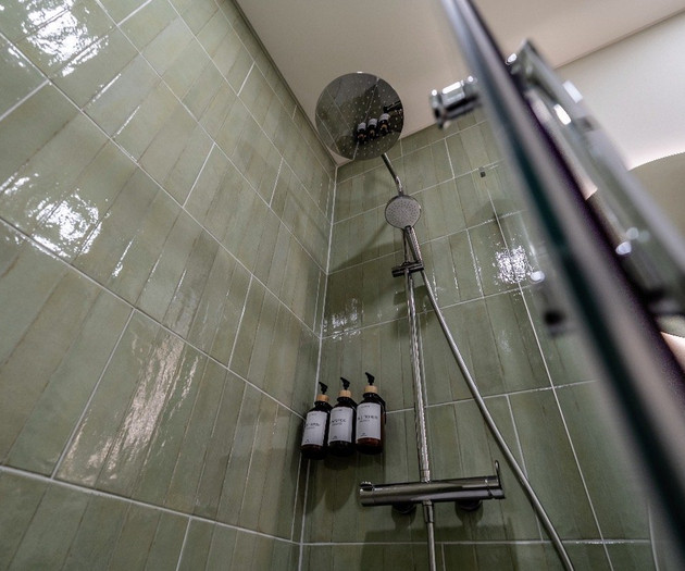Rain shower with green tiles