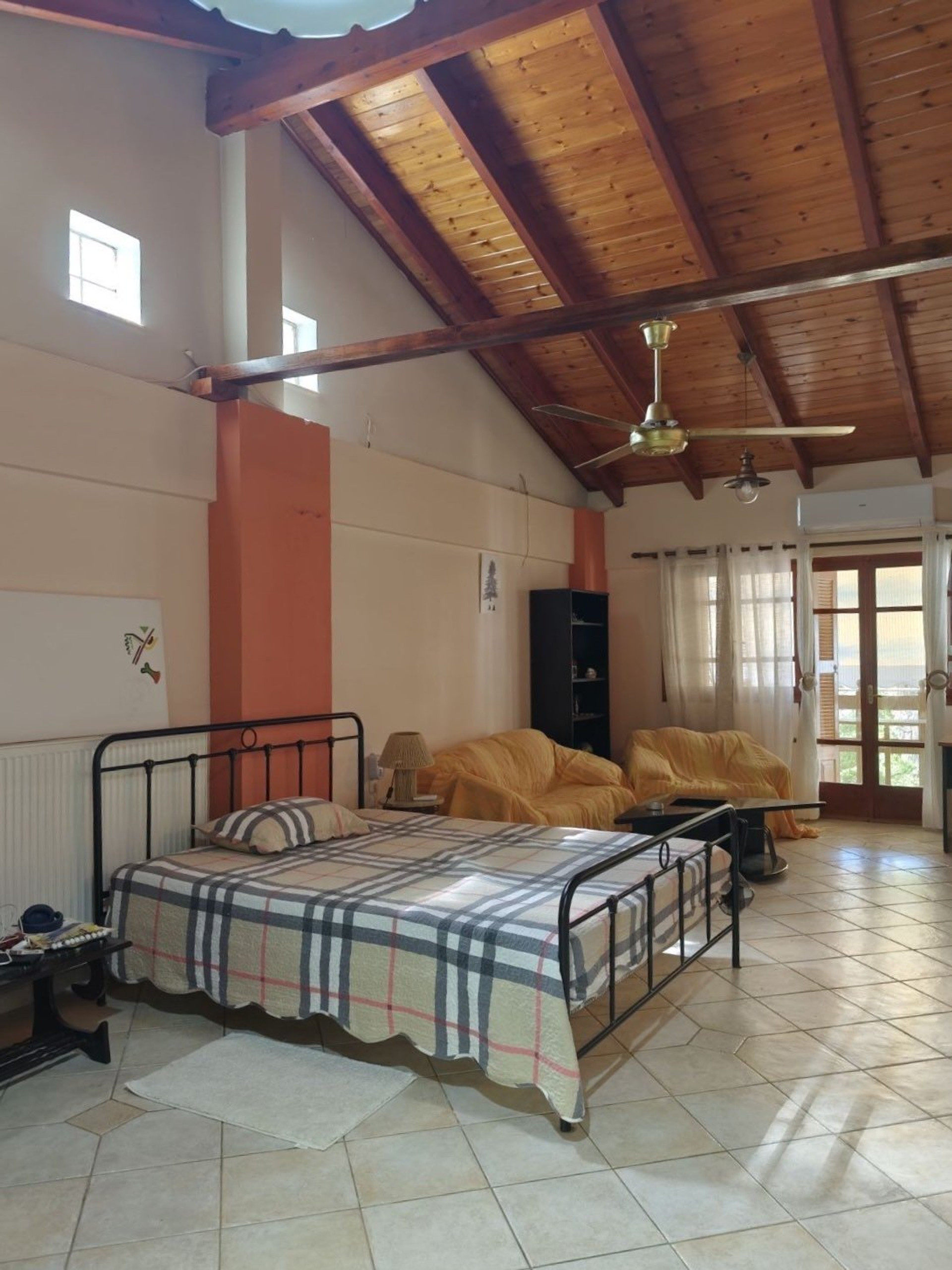 Main bedroom with vaulted ceiling