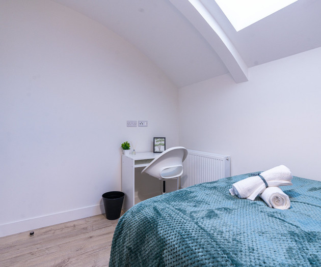 Loft bedroom with desk