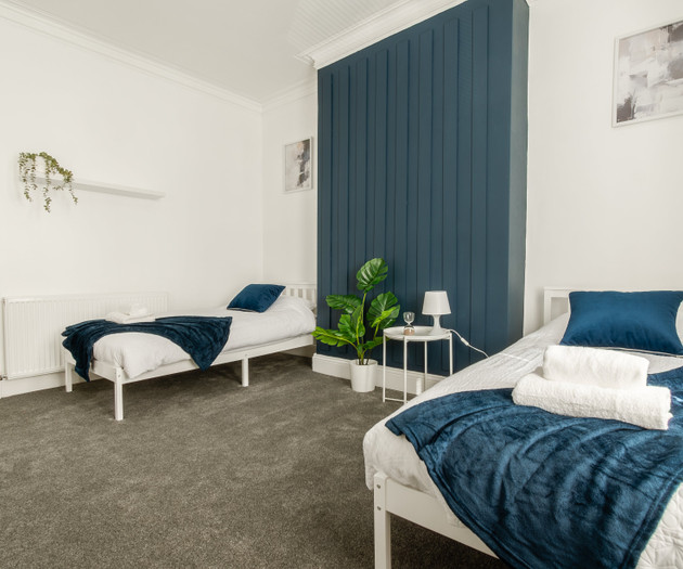 Twin beds shared bedroom