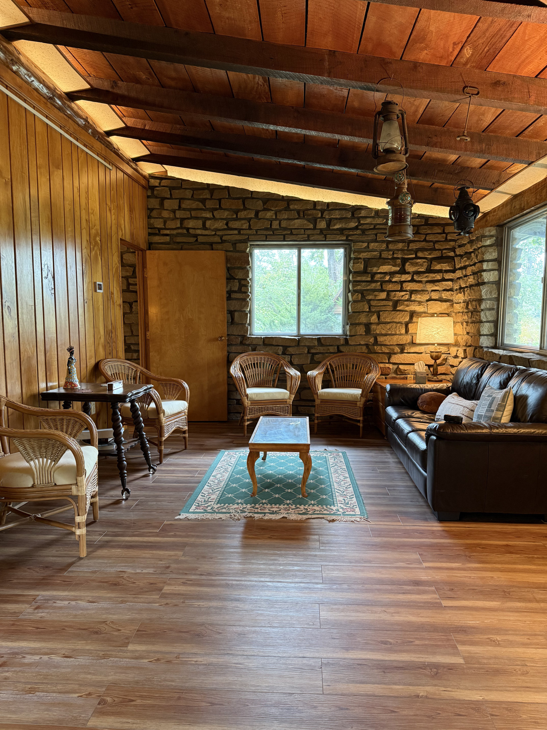 Spacious living area with wicker chairs