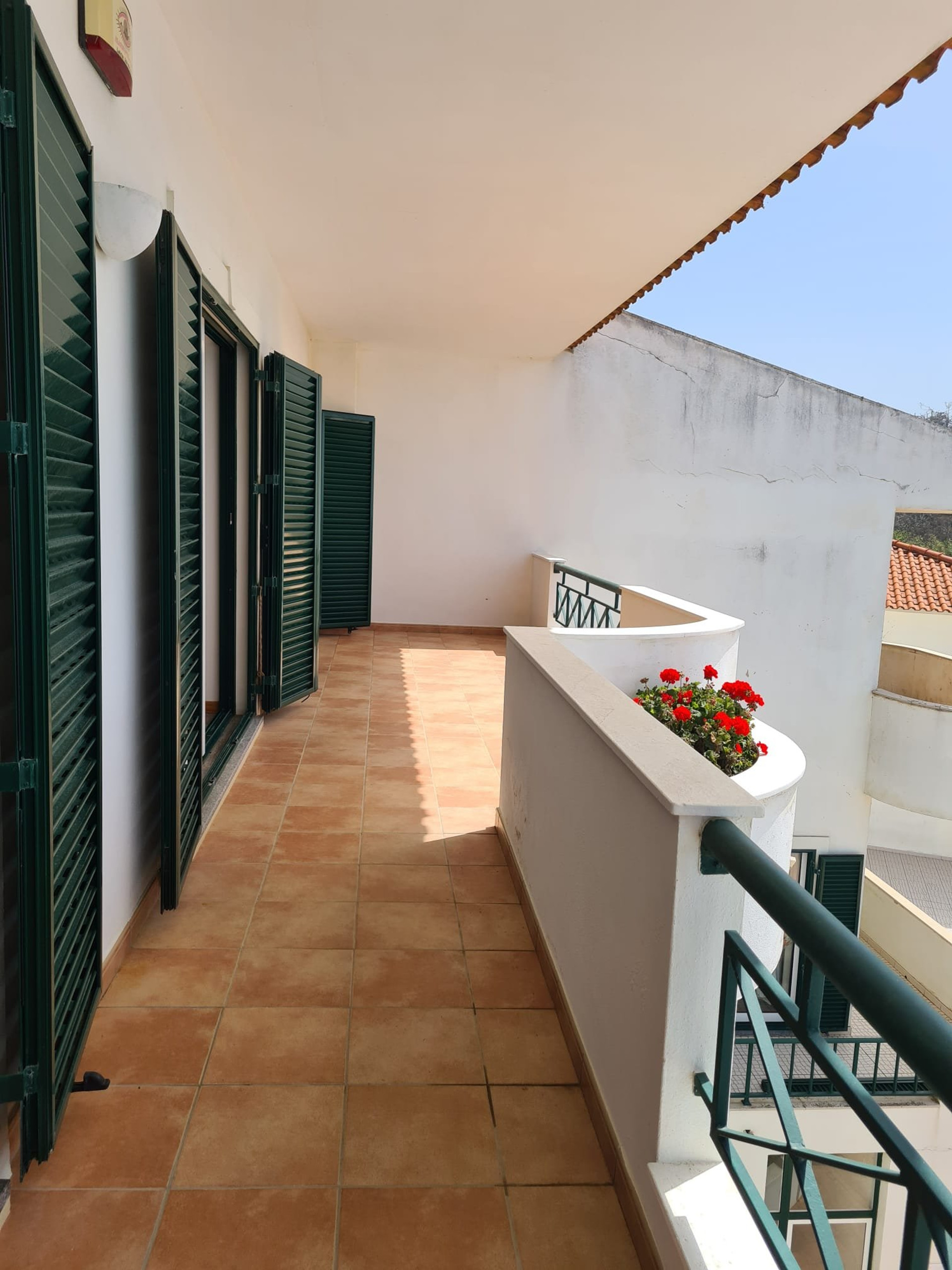 Spacious balcony with flower boxes