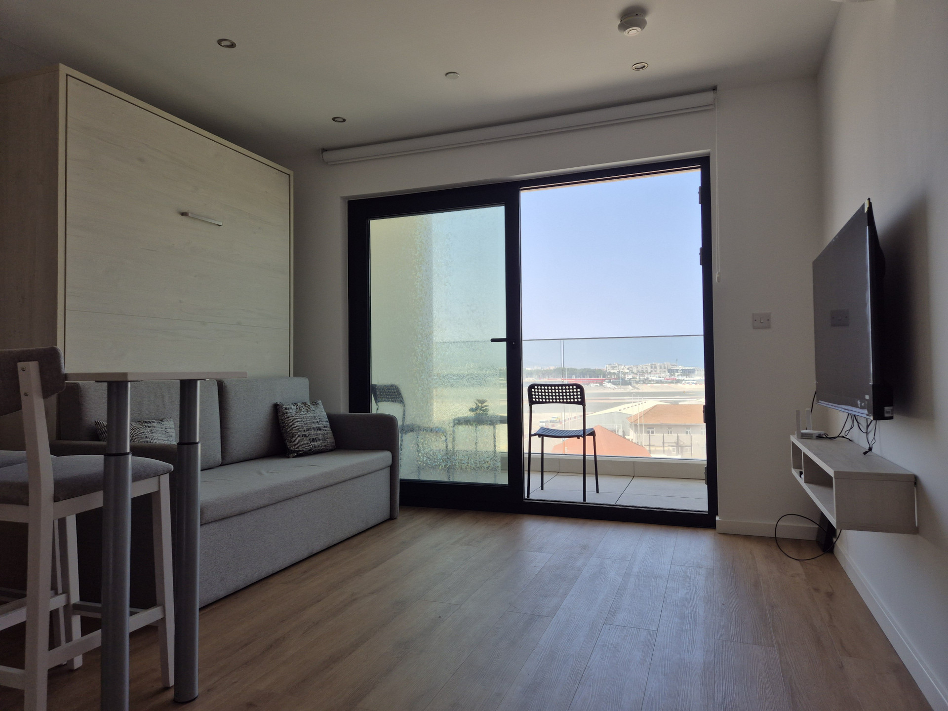Living room with balcony view