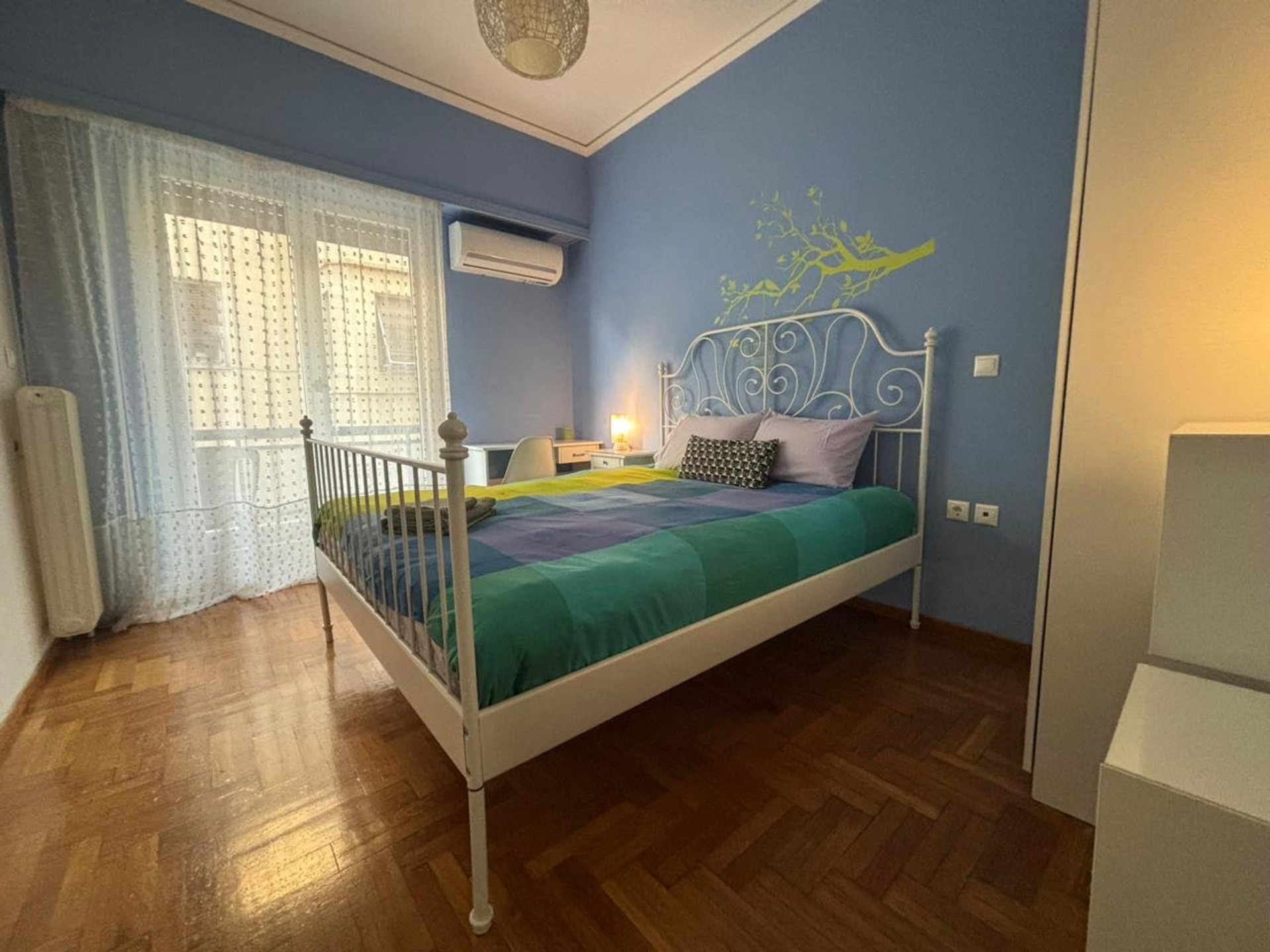 Blue bedroom wide angle view