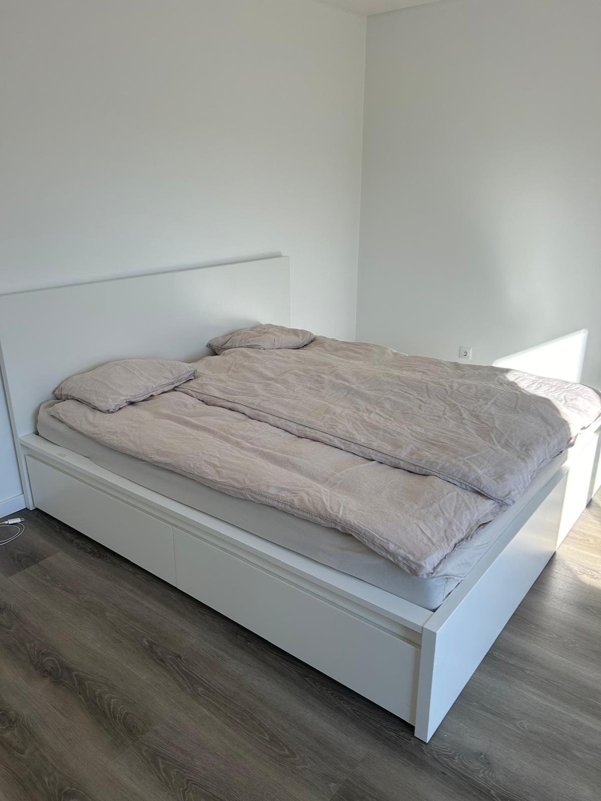 Bright bedroom with comfy bed